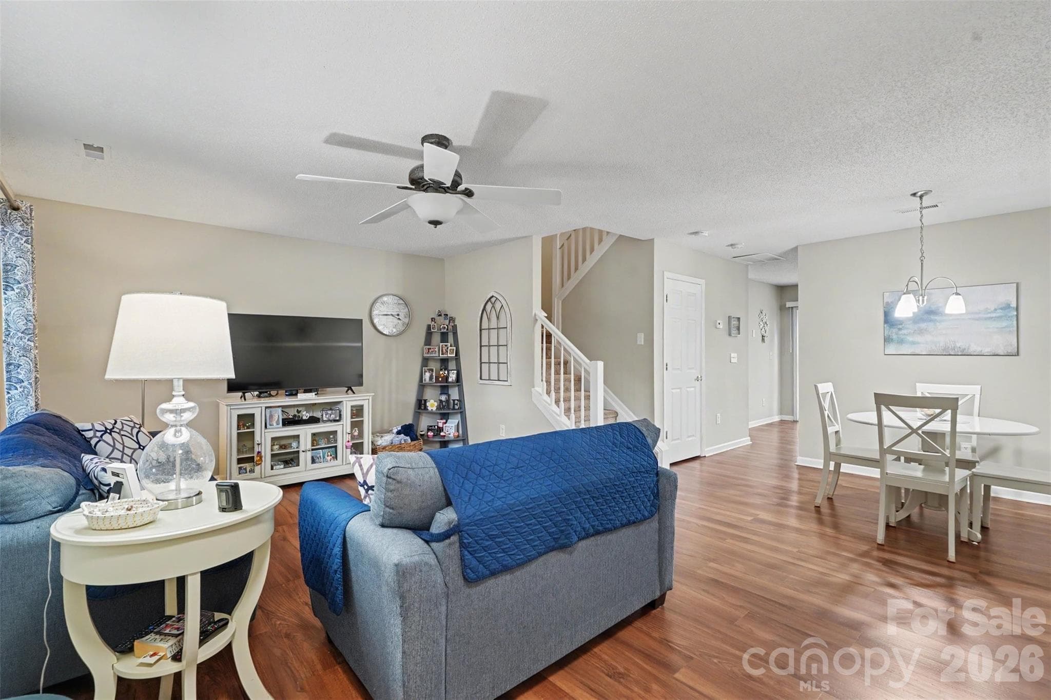Open living + dining room with LVP - Matthews