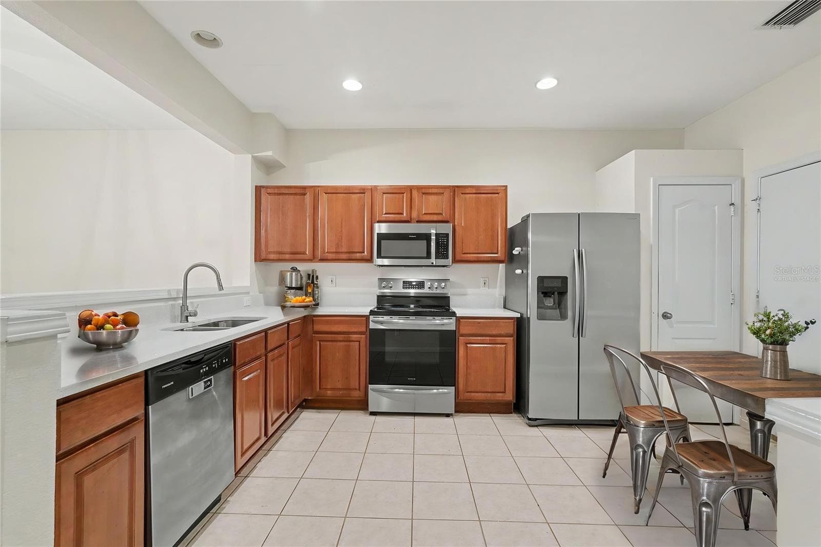 Kitchen Virtually Staged - 8471 SANDY BEACH ST, TAMPA
