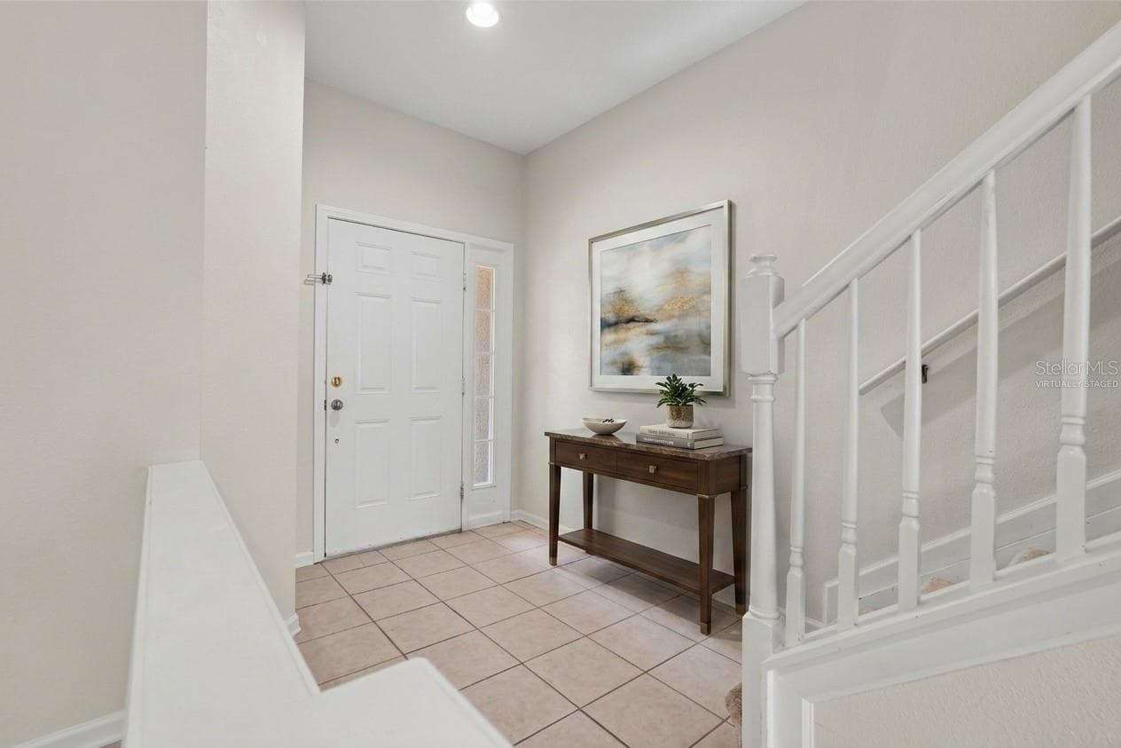 Foyer Virtually Staged - 8471 SANDY BEACH ST, TAMPA