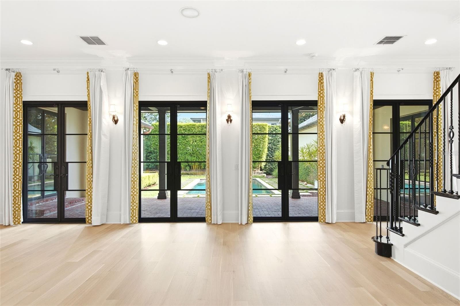 living rm overlooking pool - 2228 AZALEA PL, WINTER PARK