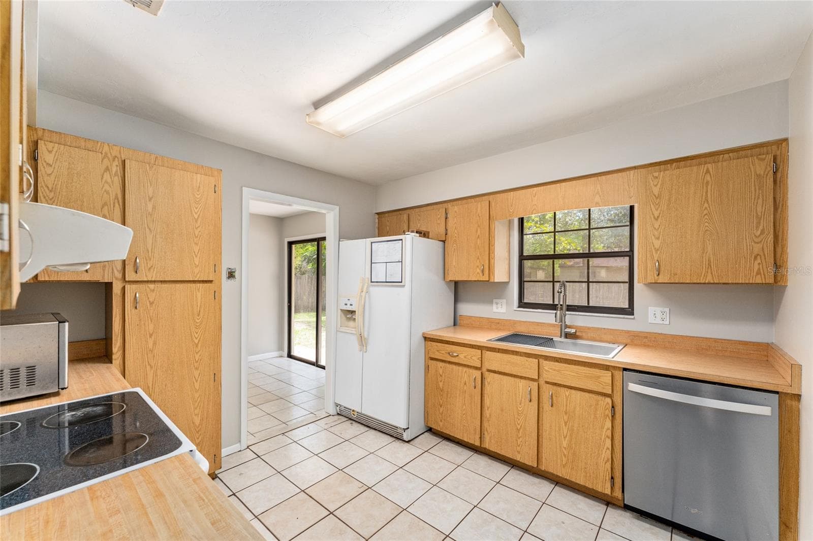 Kitchen with lots of natural light - 2541 NW 52ND PL, GAINESVILLE