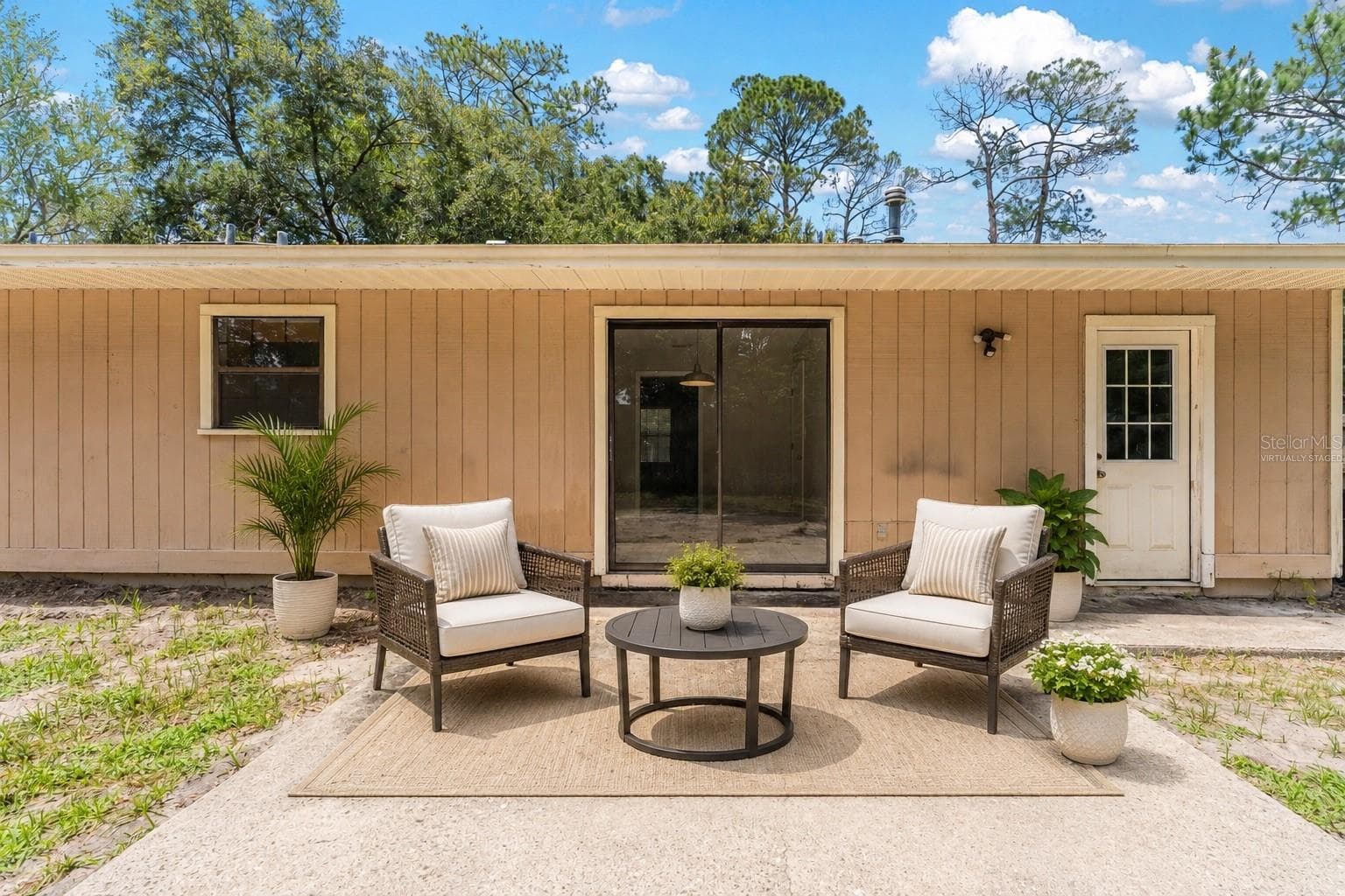 Large Fenced In Backyard with Patio - Virtually Staged. - 2541 NW 52ND PL, GAINESVILLE