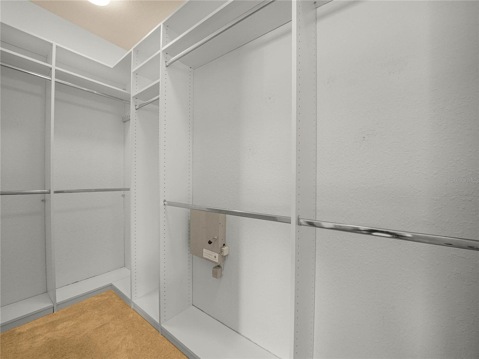 Custom Walk-In Closet in Primary Suite - 5308 GREEN DR, WINTER HAVEN