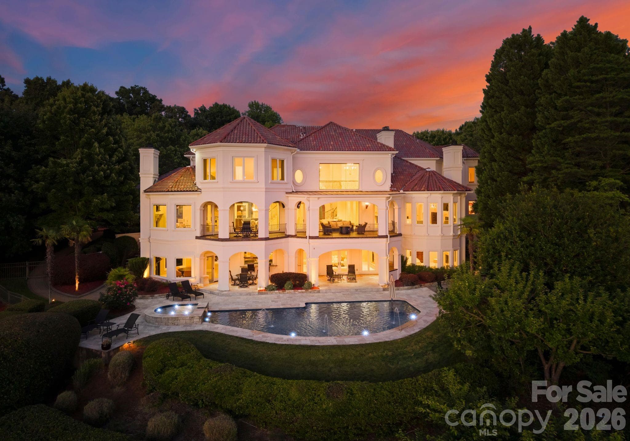 A home that feels worlds away, yet perfectly at home on North Carolina's inland sea. - 16920 Harbor Master Cove, Cornelius