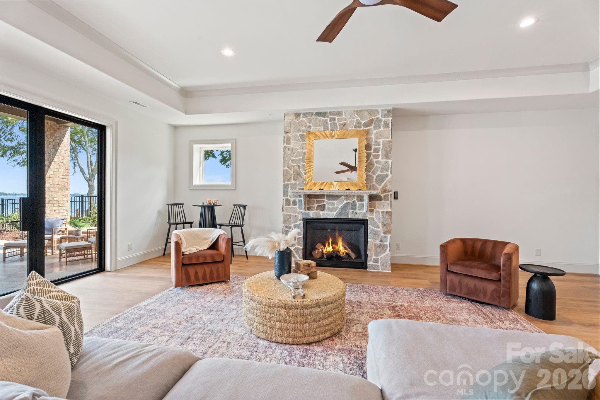 Gas fireplace with stone accent - 2494 Primm Road, Denver
