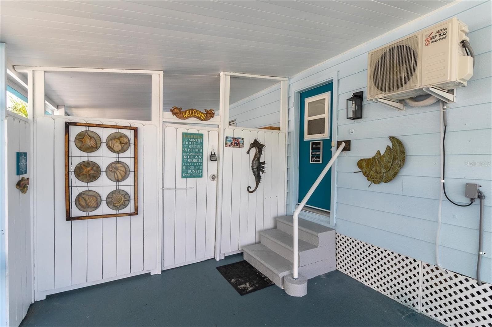 Main entrance into the home is thru the carport. Directly into the living area! - 6629 TOWER DR, HUDSON