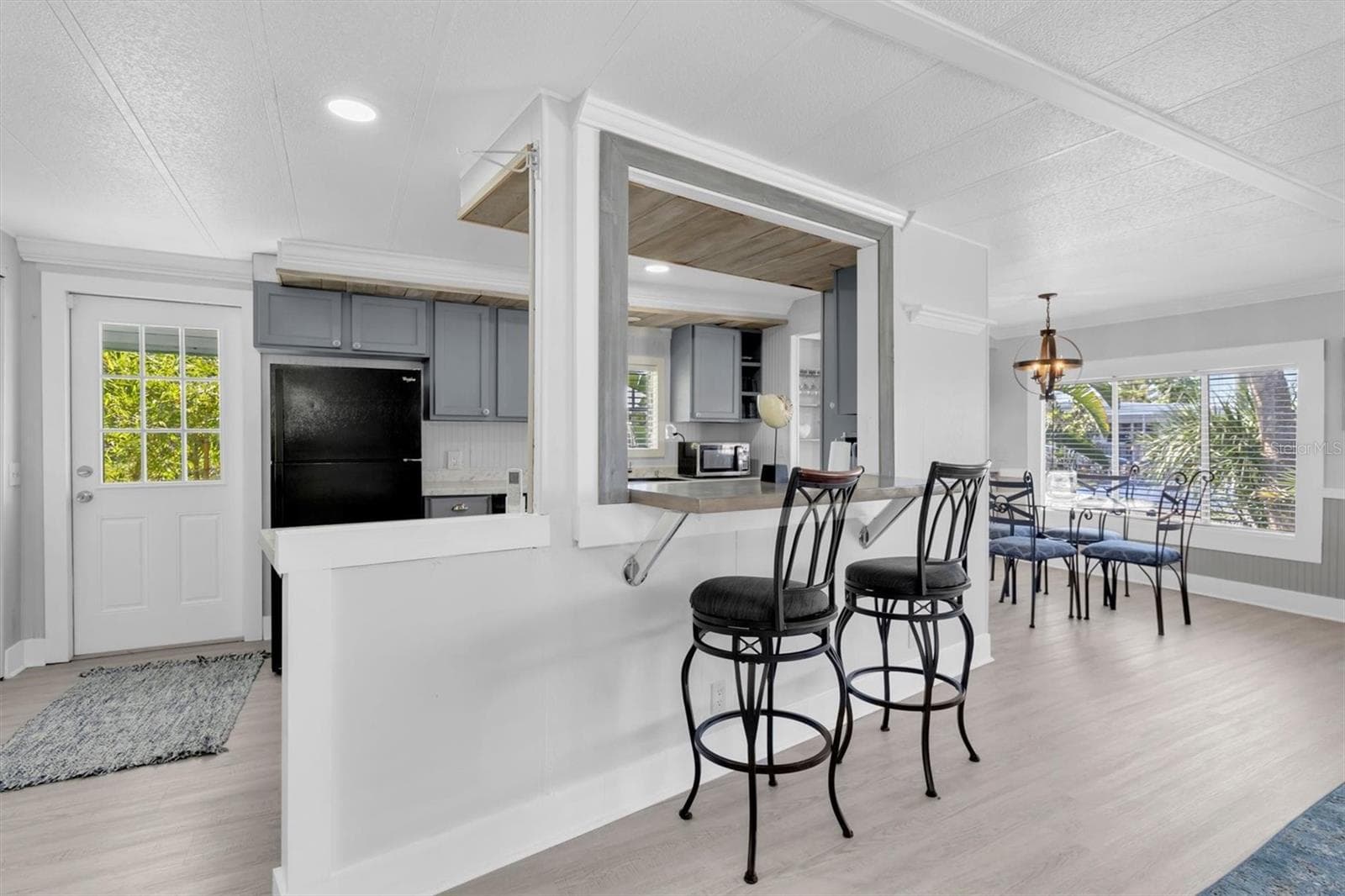 Seating area over looking the kitchen and living room area. - 6629 TOWER DR, HUDSON