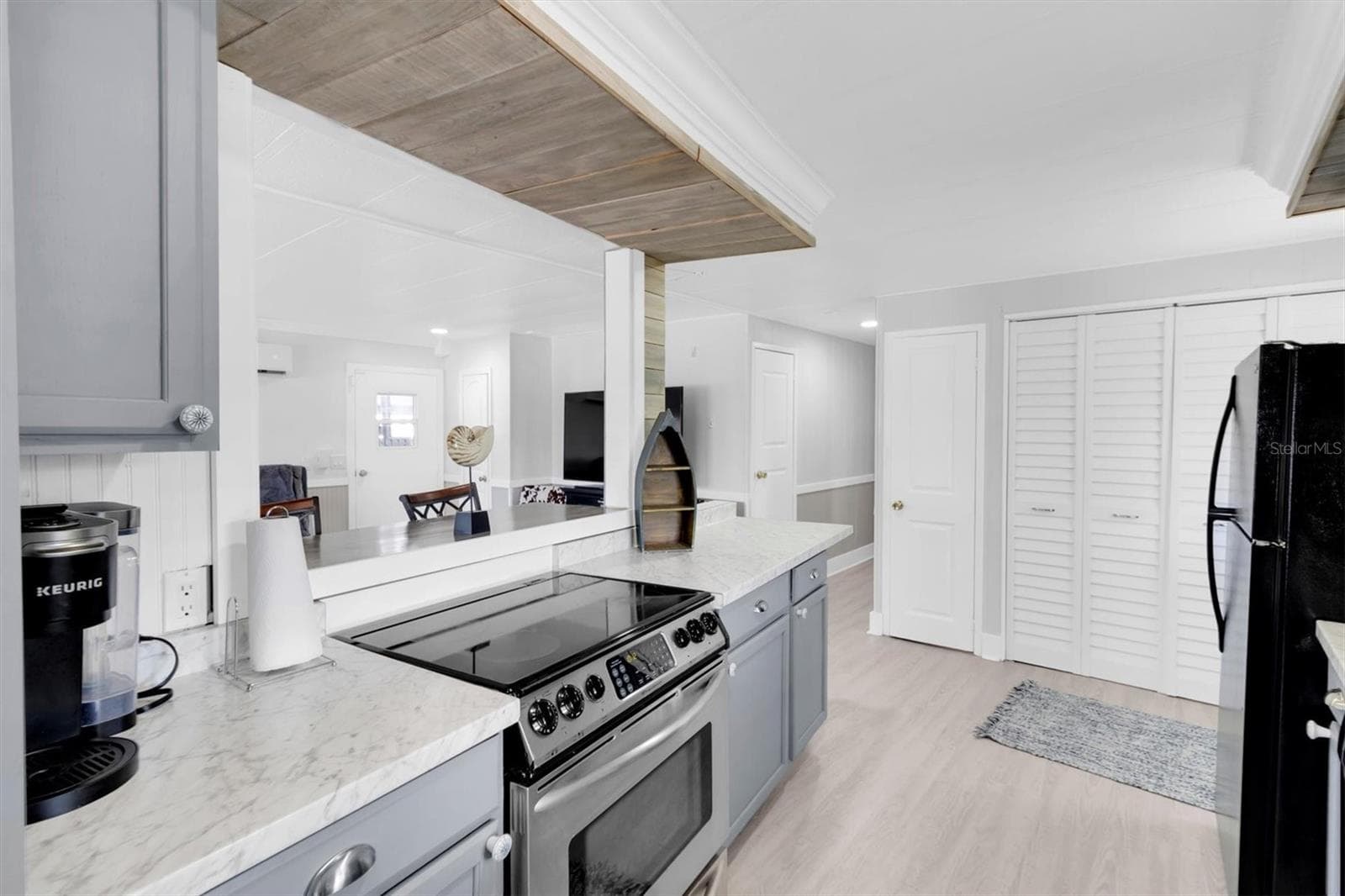 Inside laundry area is located outside the kitchen area. - 6629 TOWER DR, HUDSON