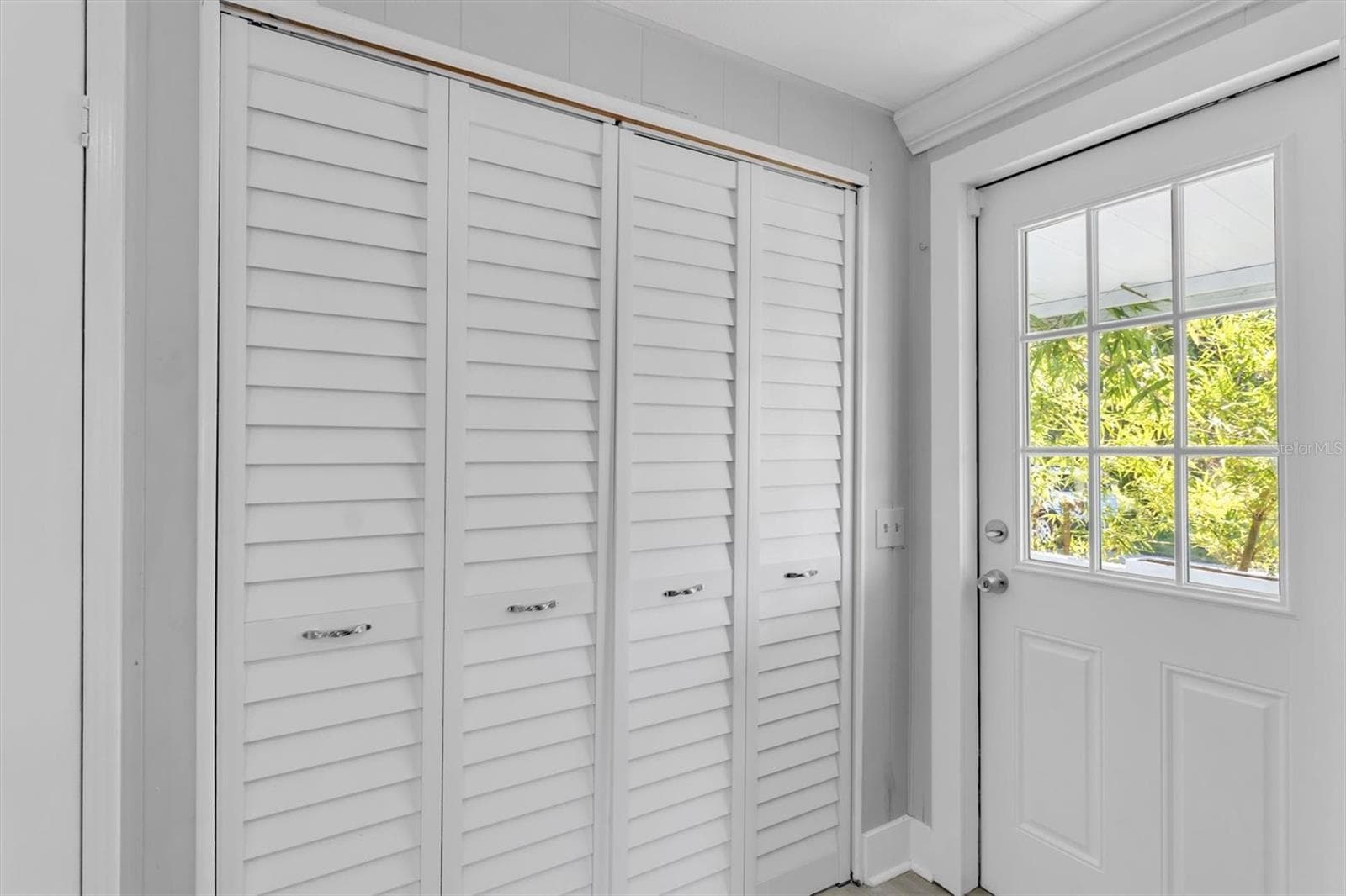 Laundry area and small porch area to the right. - 6629 TOWER DR, HUDSON