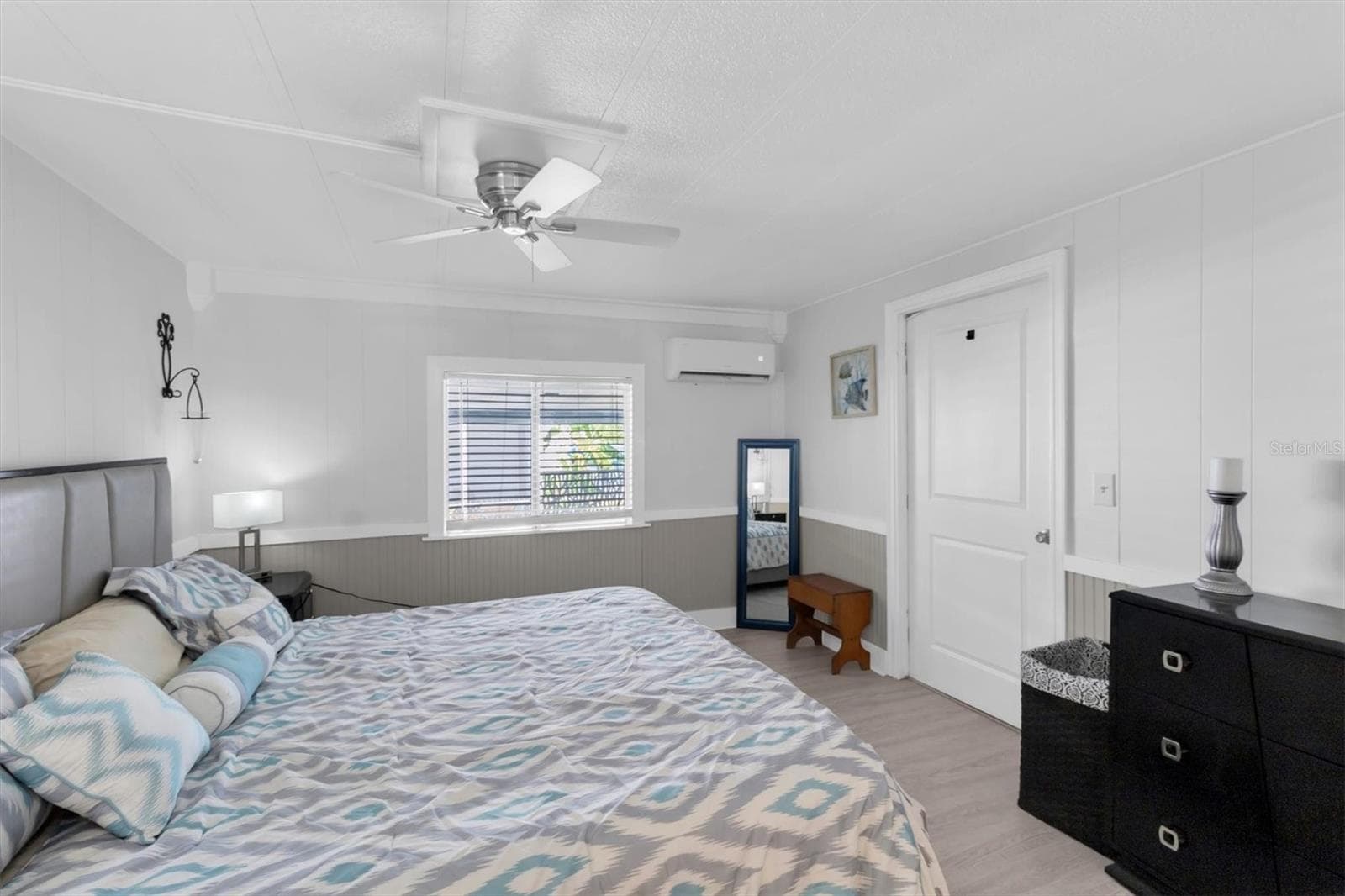 Master bedroom with access to the Florida room which can also be used for a additional bonus room, office or just ANOTHER entertainment area. - 6629 TOWER DR, HUDSON