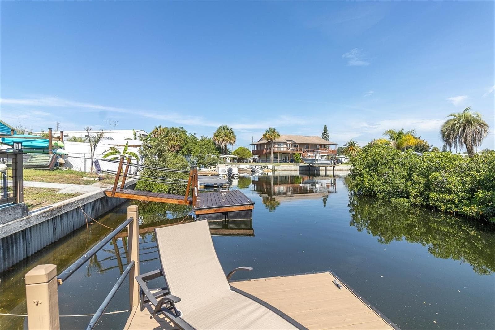 Canal view Looking left/west from the canal side. - 6629 TOWER DR, HUDSON