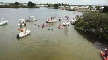 The only sandbar in Hudson is located on the way to the gulf. Called many things Redneck Riveria, Okey Dokey, Signal Cove Yacht Club! - 6629 TOWER DR, HUDSON
