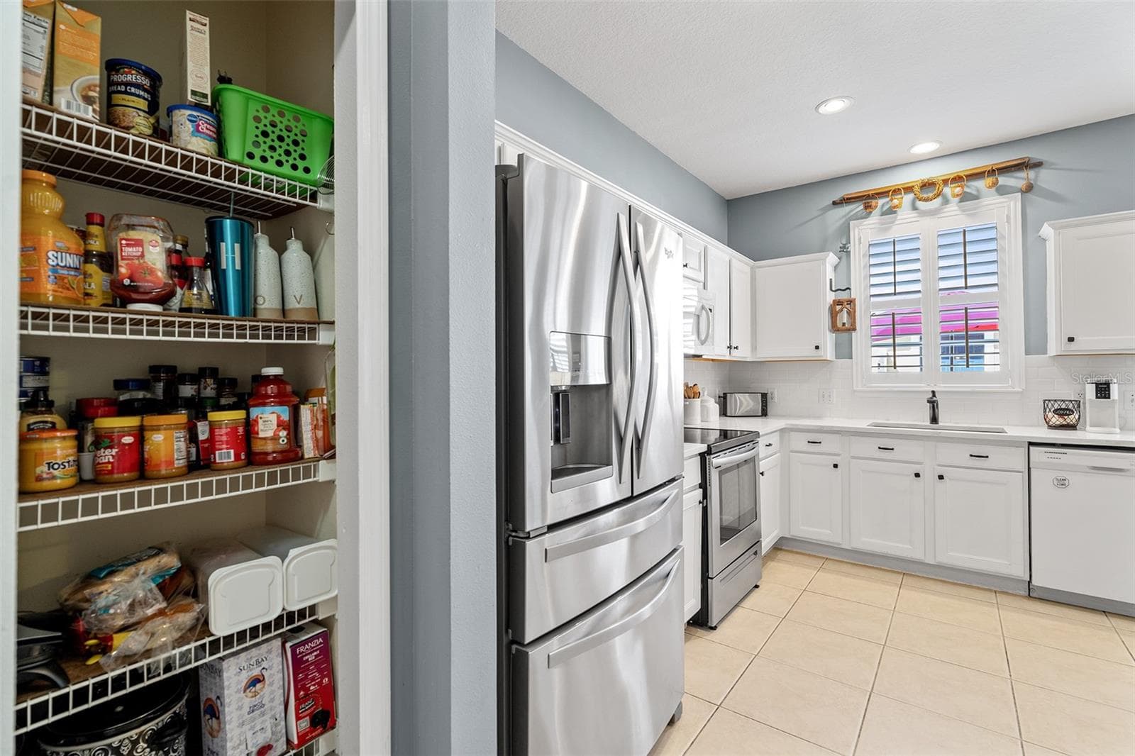 Townhouse at 7134 FIVE OAKS DR #4B, ST CLOUD, photo 12 of 59