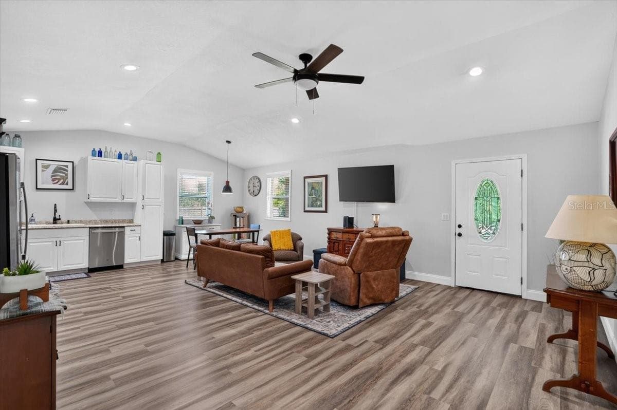 Living room open concept in law or guest house - 11740 DARSEY RD, PARRISH