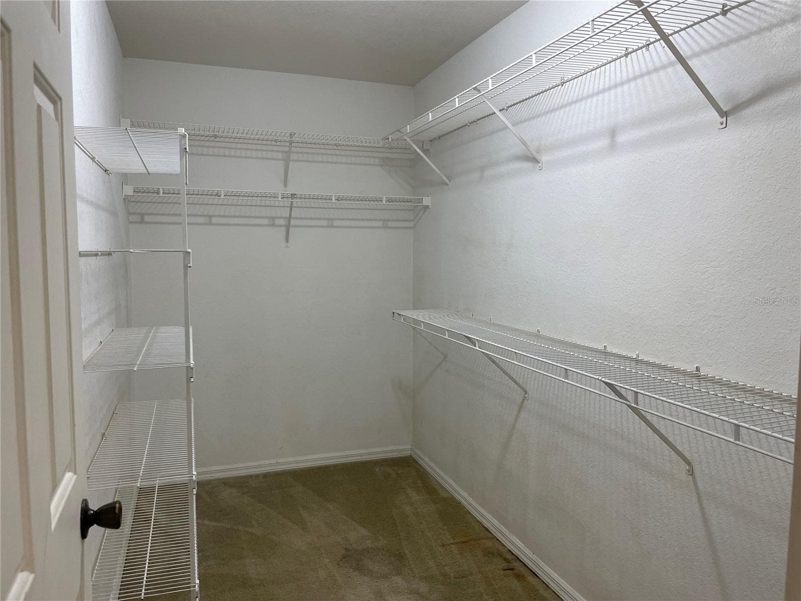 Primary bedroom walk in closet - 4060 CALATRAVA AVE, NORTH PORT