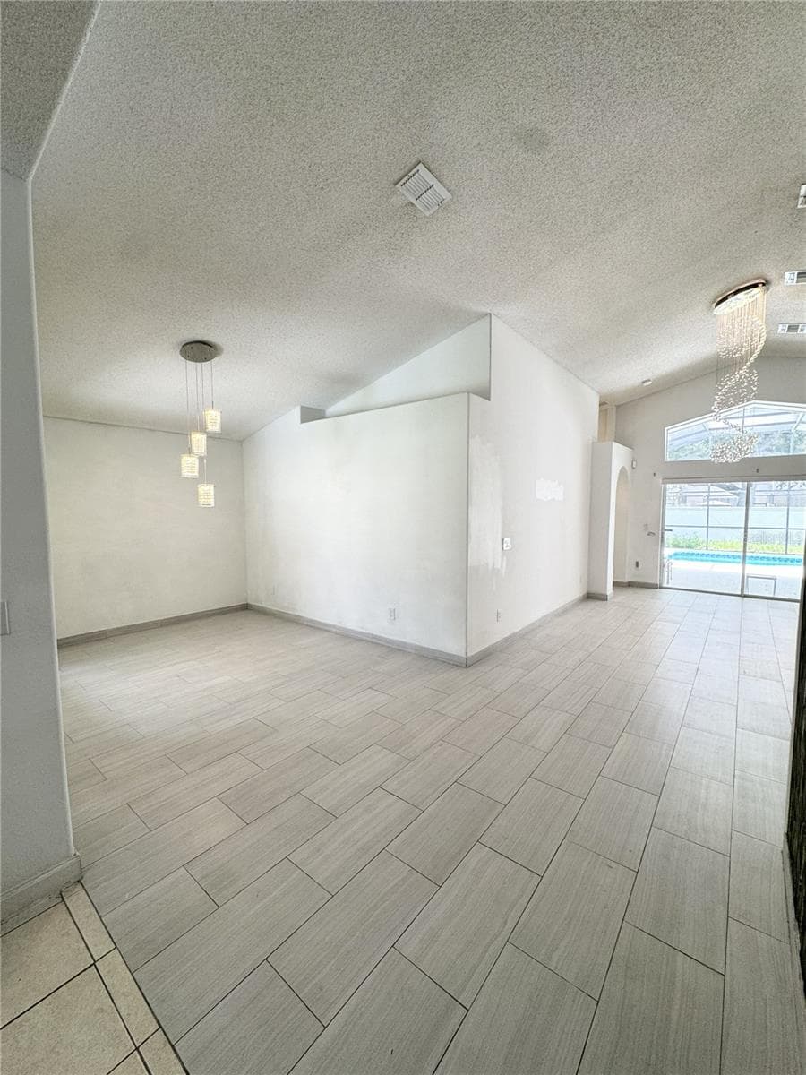 Dining and living space - 2627 ONEIDA LOOP, KISSIMMEE