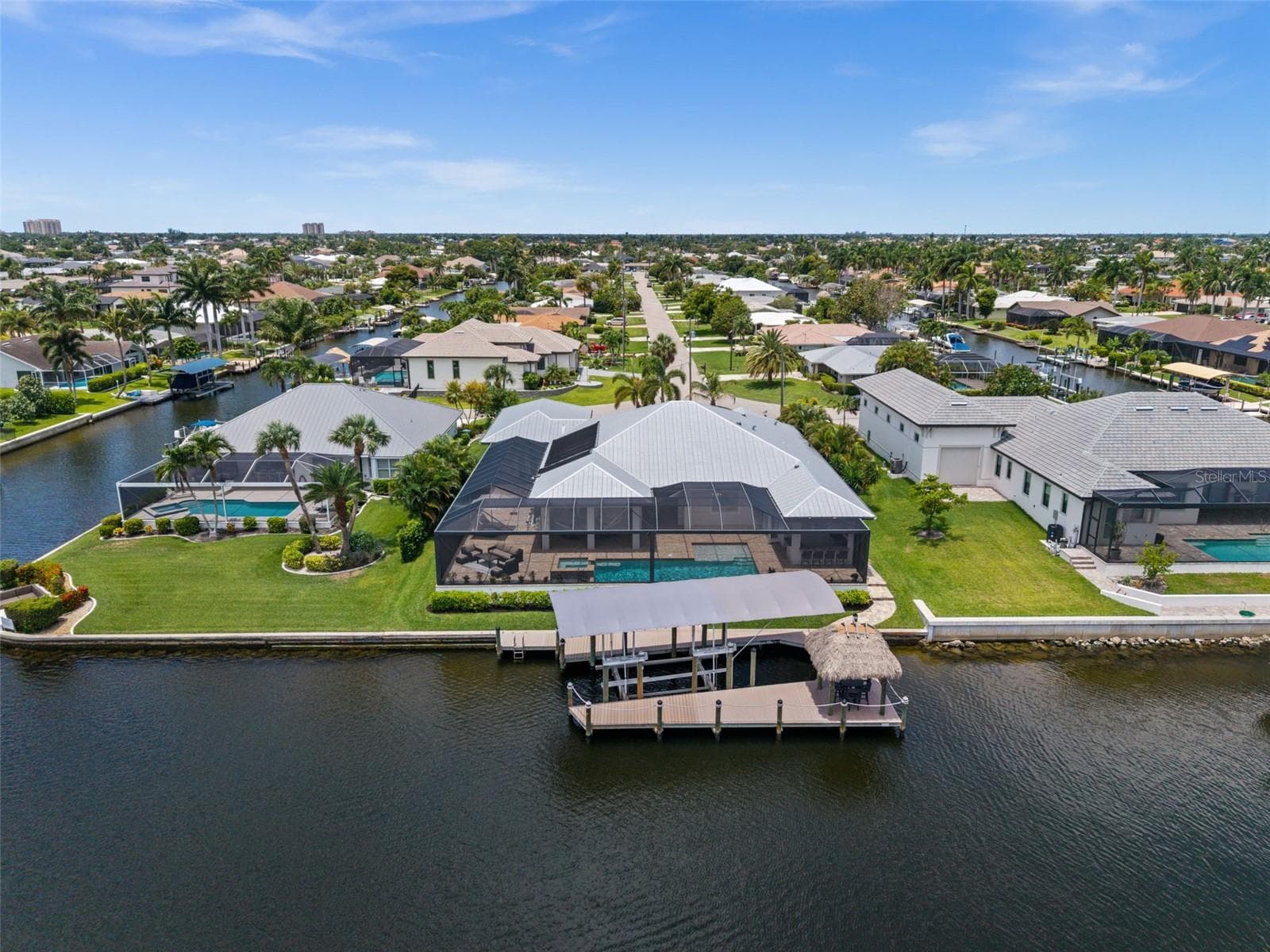 Aerial view of the dock and covered lift - 105 SW 52ND ST, CAPE CORAL
