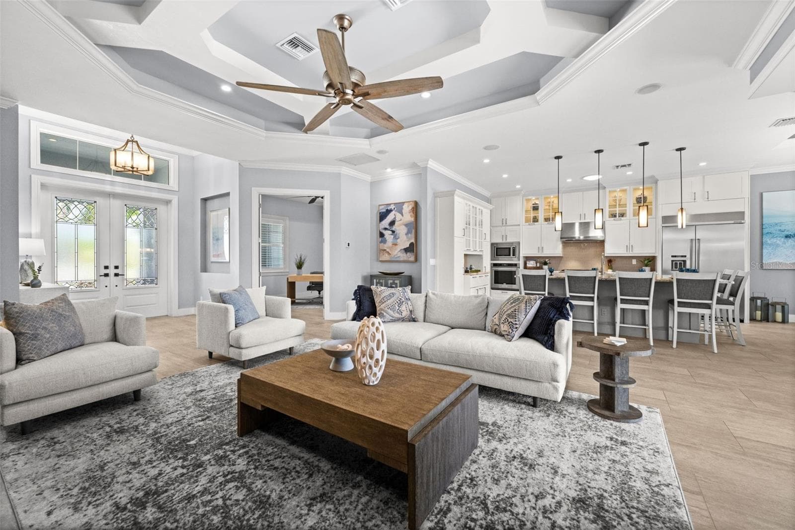Beautiful tray ceiling in the living room - 105 SW 52ND ST, CAPE CORAL