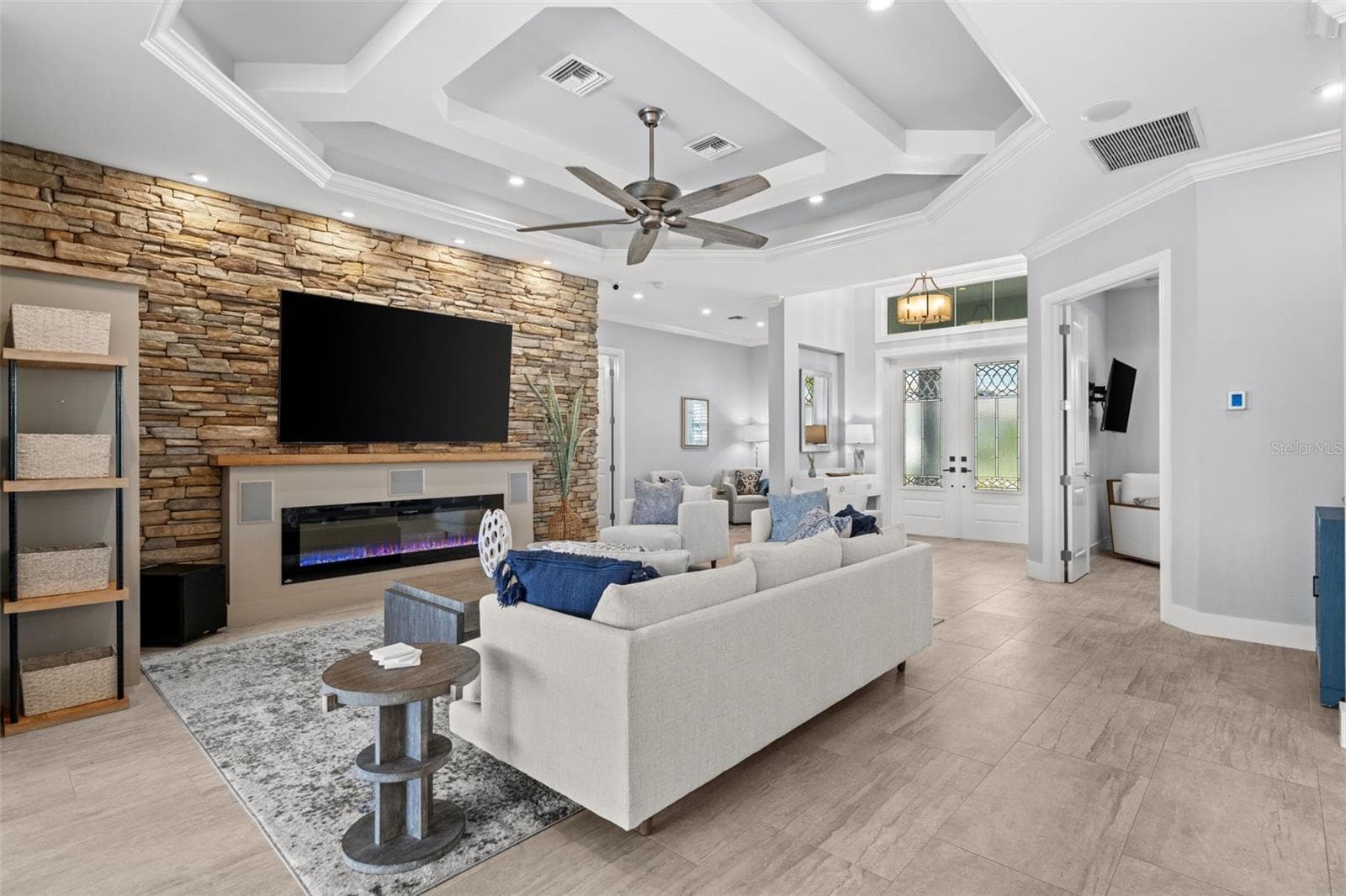 Accent wall with linear electric fireplace and tv - 105 SW 52ND ST, CAPE CORAL