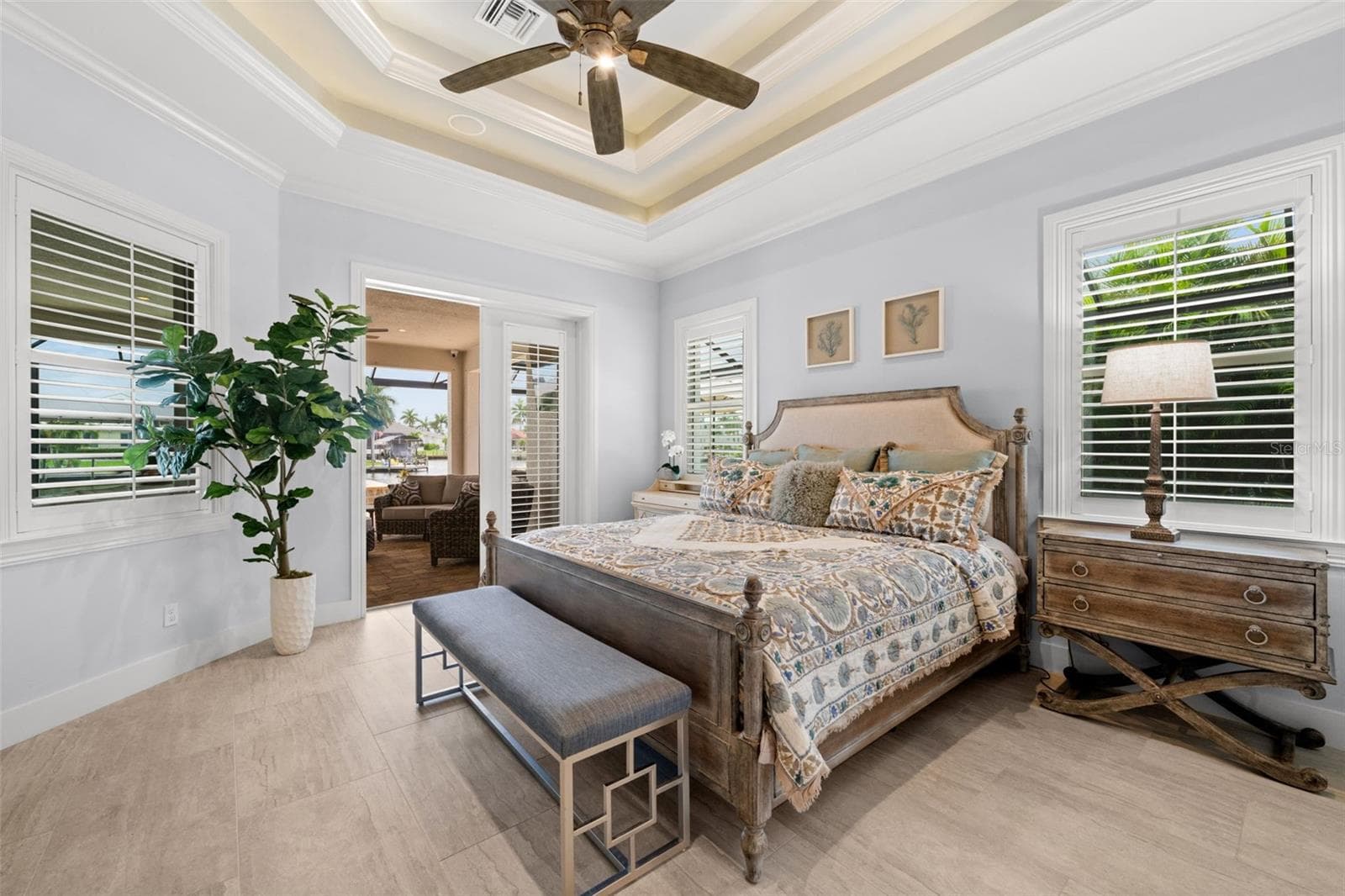 Primary suite with beautiful double tray ceiling - 105 SW 52ND ST, CAPE CORAL