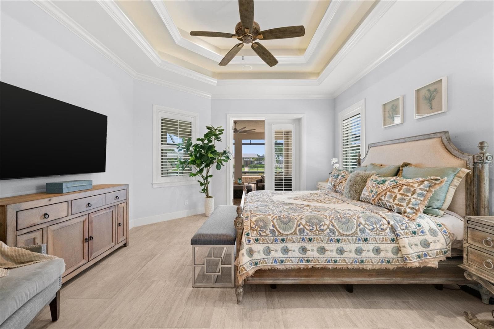 Direct access to the lanai and pool from the primary suite - 105 SW 52ND ST, CAPE CORAL