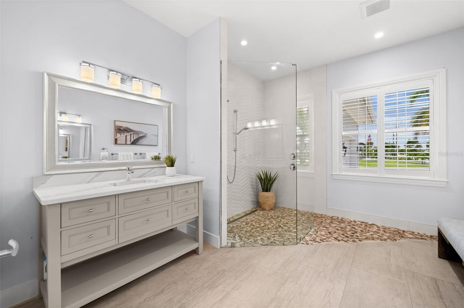 Primary bath with custom tile and glass wet room - 105 SW 52ND ST, CAPE CORAL