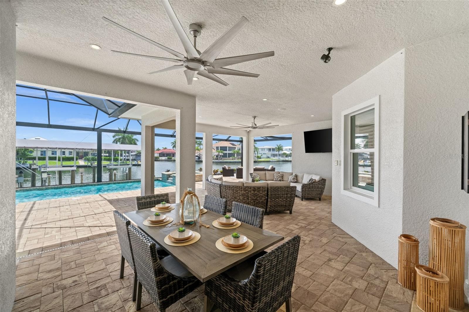Large lanai dining space - 105 SW 52ND ST, CAPE CORAL