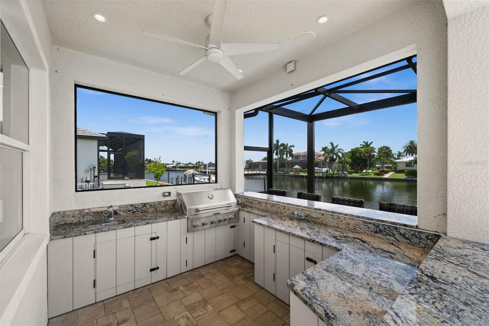 Outdoor kitchen with built in propane grill - 105 SW 52ND ST, CAPE CORAL