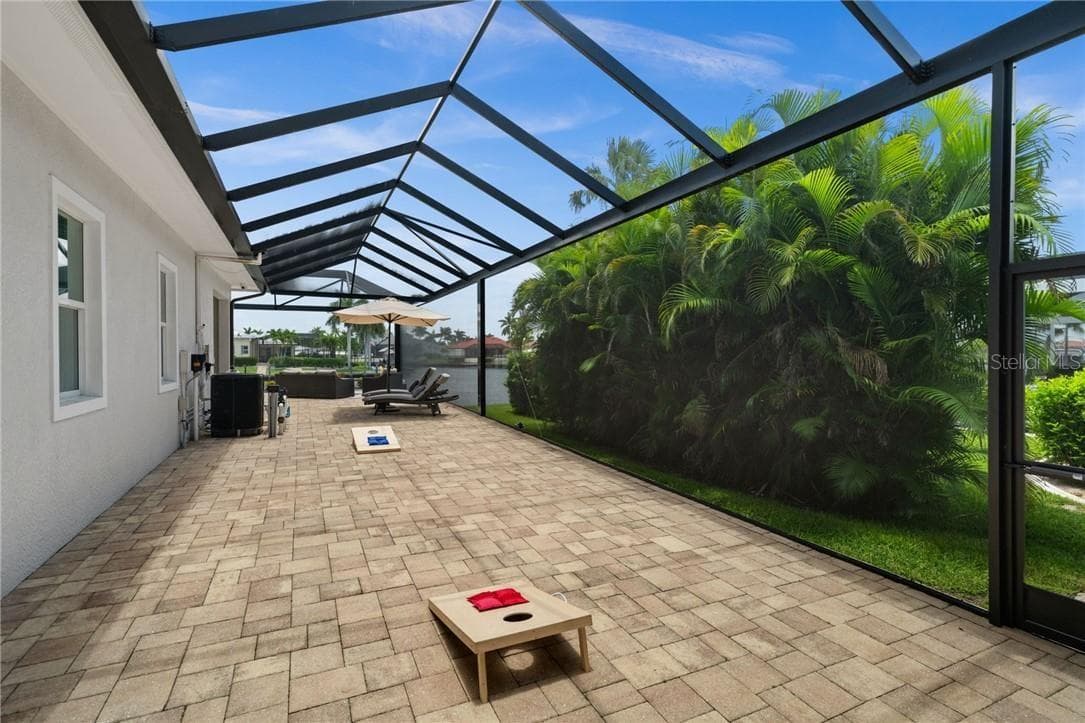 Tons of screened living area - 105 SW 52ND ST, CAPE CORAL