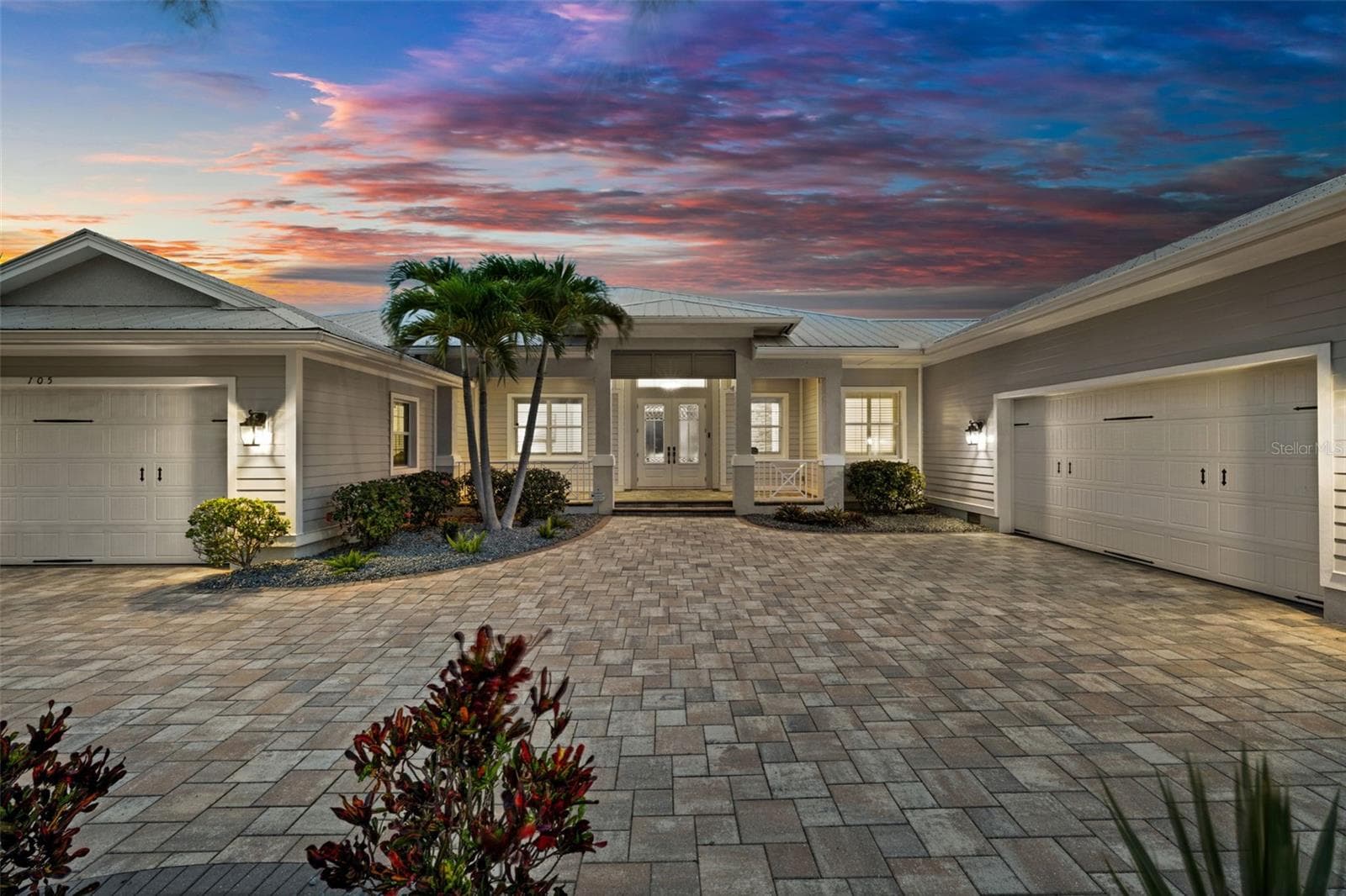 The view as your guests pull up in the evening - 105 SW 52ND ST, CAPE CORAL