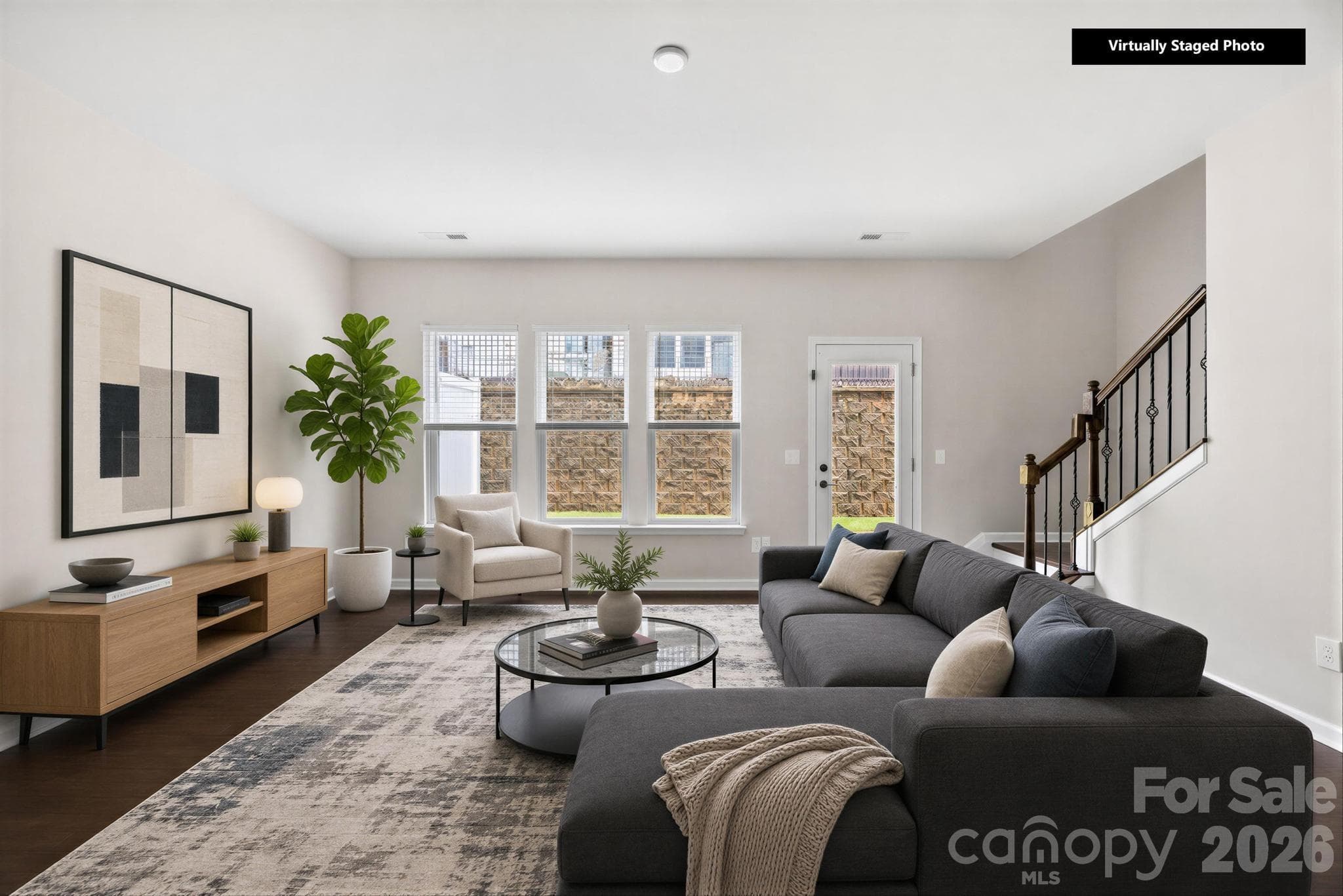 Generous living room virtually staged so you can see the possibilities. - Charlotte