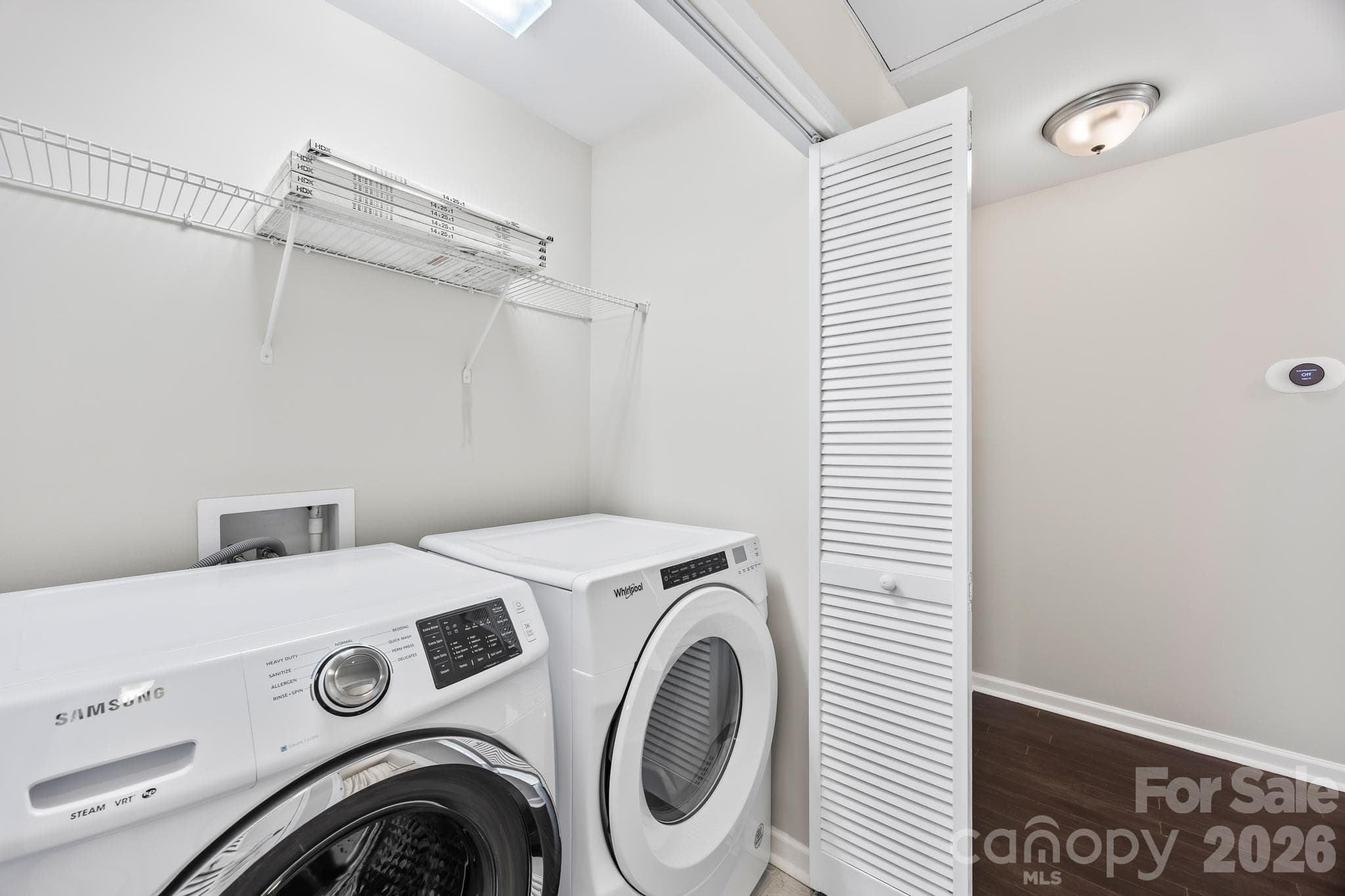 Enjoy the convenience of an upstairs laundry room just steps from all three bedrooms. - Charlotte