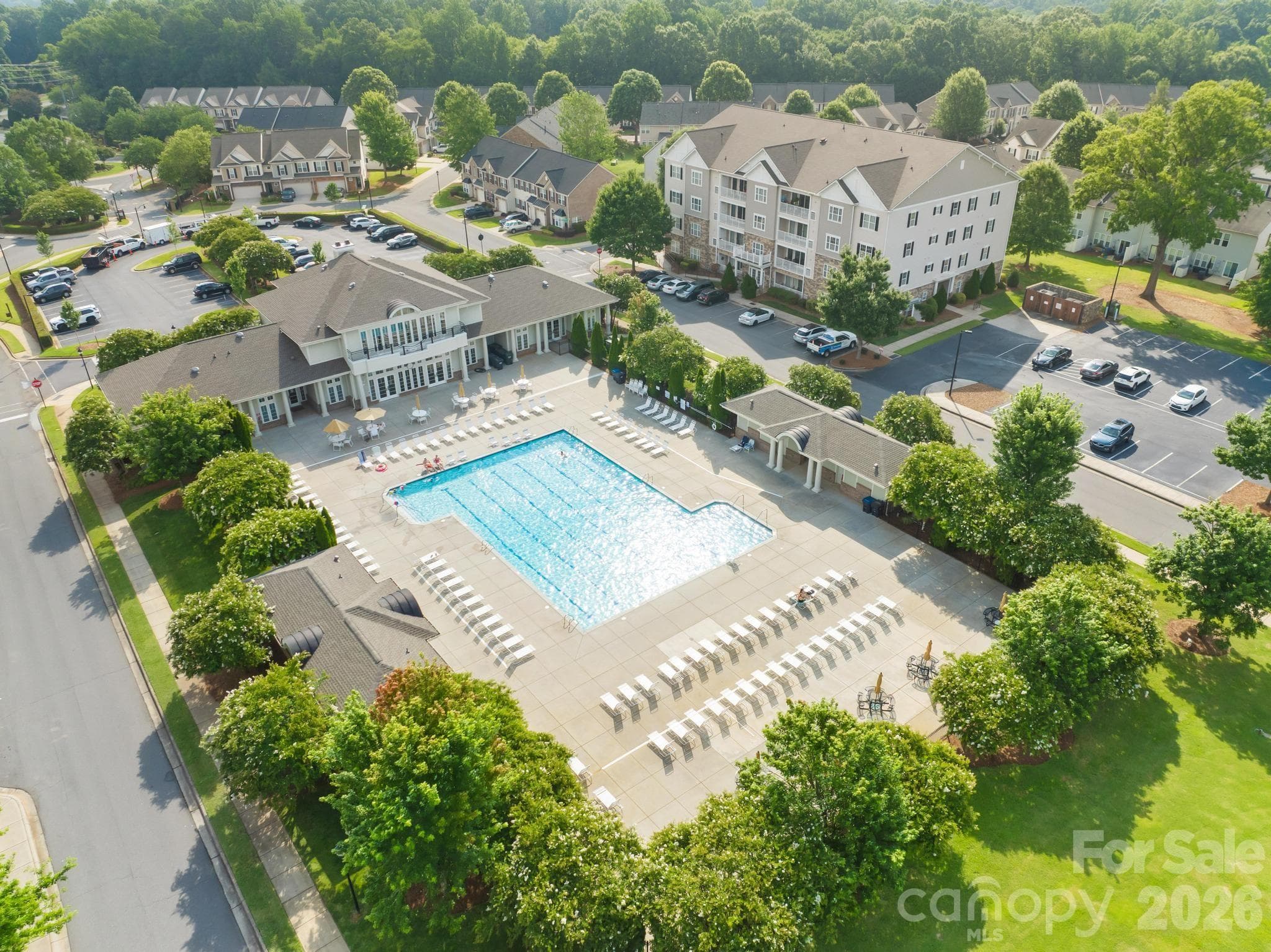 Enjoy resort-style living with a junior Olympic swimming pool and beautifully appointed clubhouse, offering the perfect setting to relax, socialize, and connect with neighbors. - Charlotte