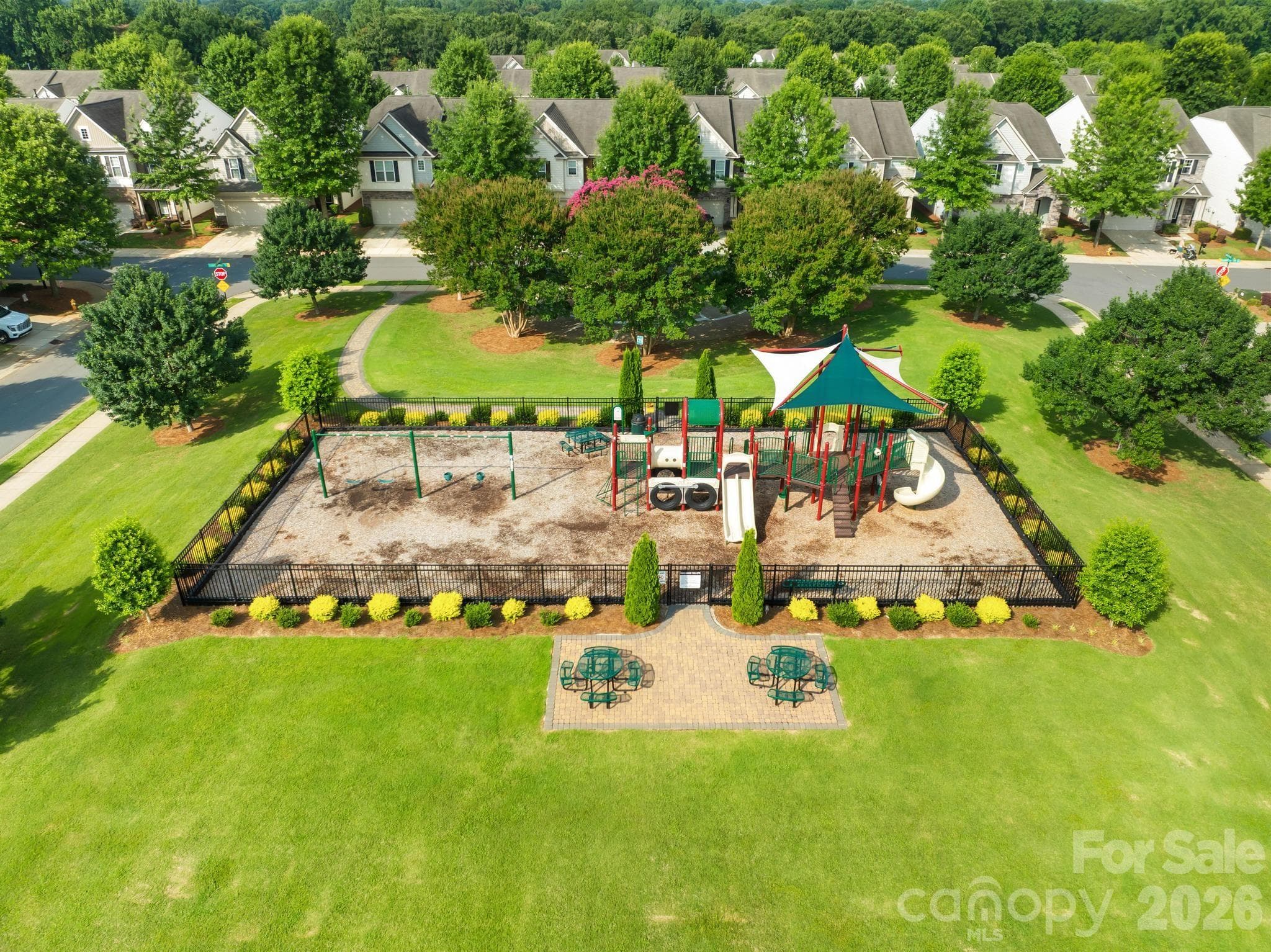 The neighborhood playground provides a fun outdoor space for recreation and play. - Charlotte