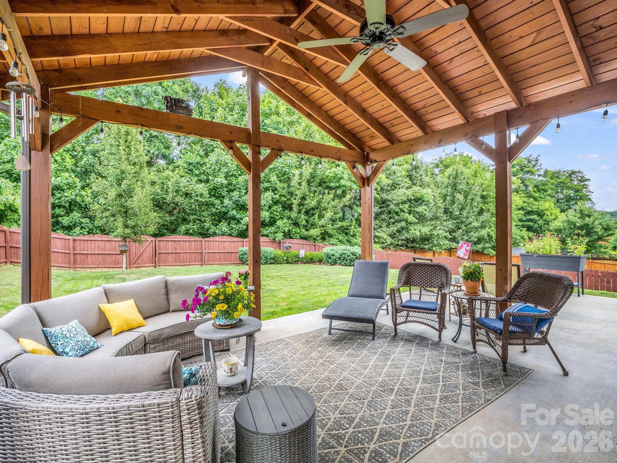 Enjoy the covered patio throughout the seasons. - Arden