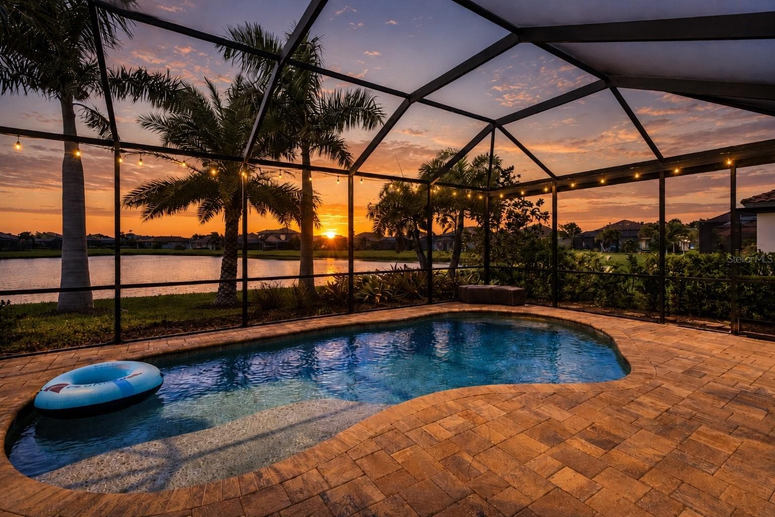 Sunset view from the covered lanai - 10107 CARNOUSTIE PL, BRADENTON