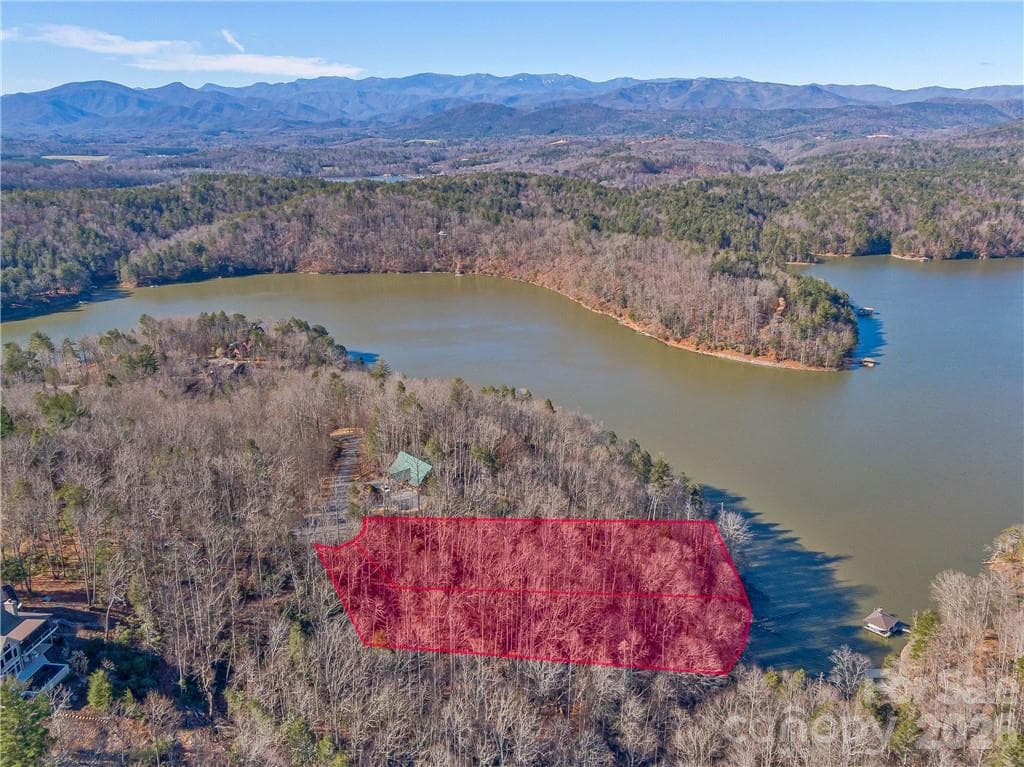 Tranquility awaits: rare double waterfront lot with mountain and lake views in a quiet cove in The Arbor at Lake James. - Nebo