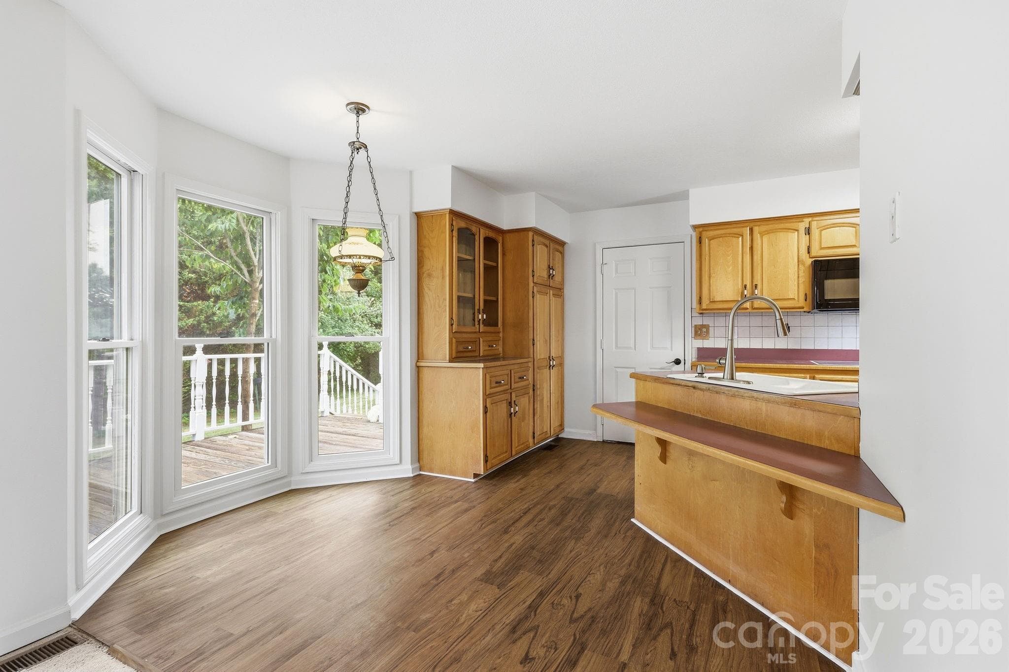 From Family Room towards breakfast area/kitchen-Door leads to garage - 1091 WINDSWEPT RIDGE Road, Marshall