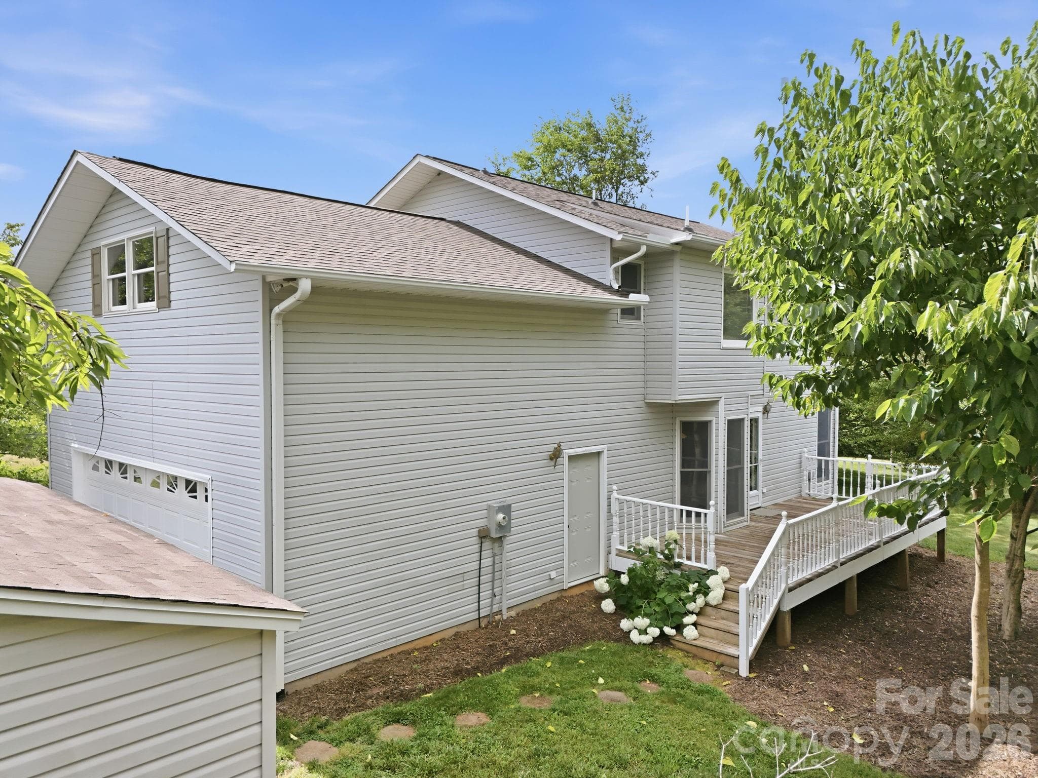 Back Deck entry & side entry to Garage - 1091 WINDSWEPT RIDGE Road, Marshall