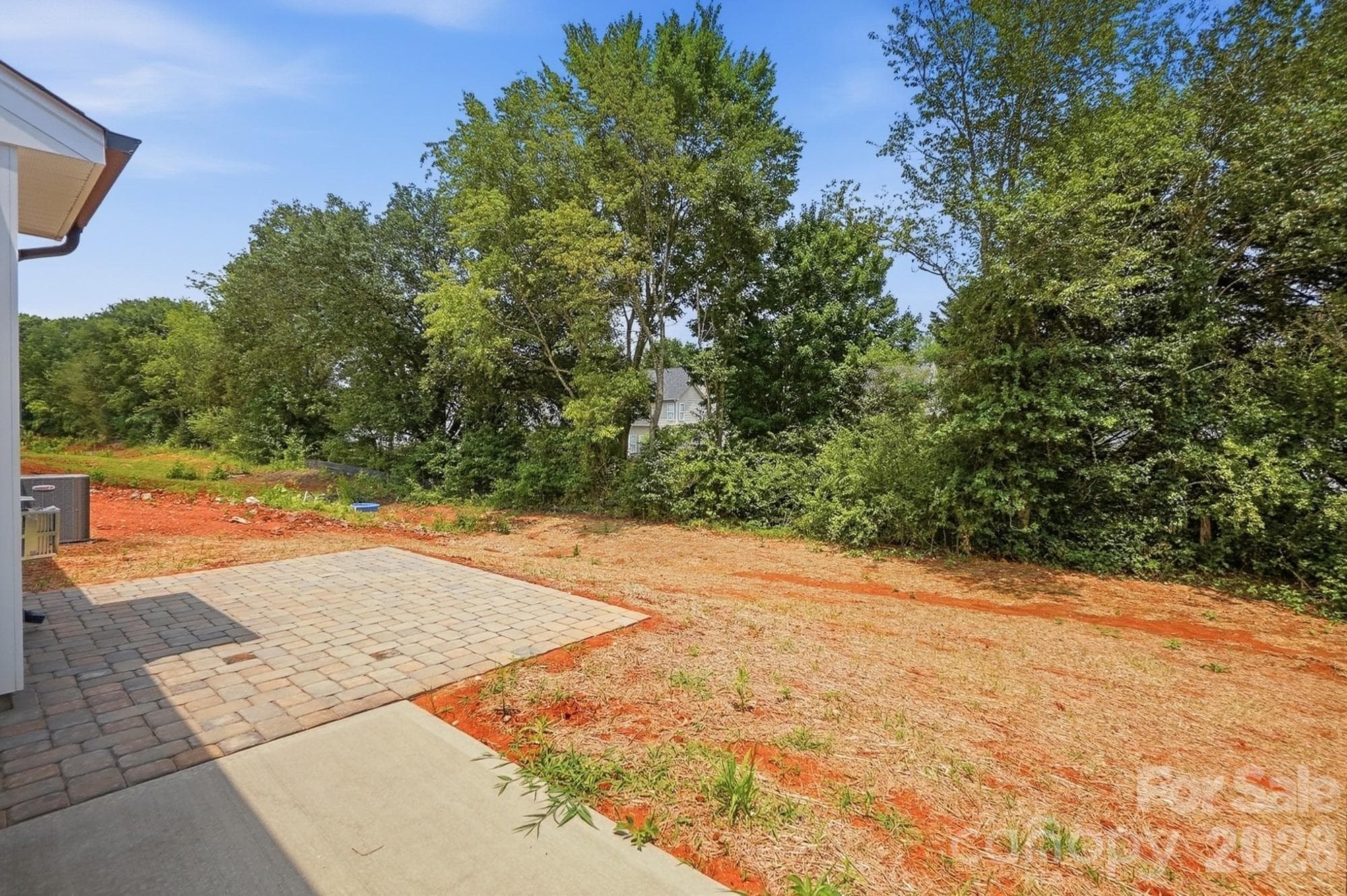 Backyard patio and paver patio- grass is in progress - 3050 Constitution Lane, Gastonia