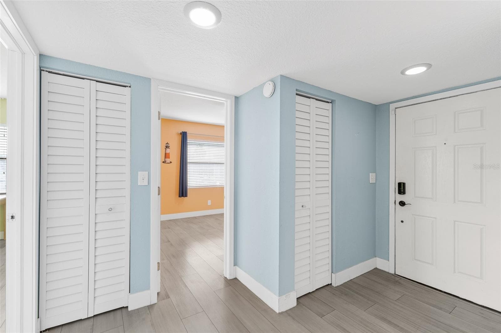 Hallway to secondary Bedrooms - 3165 N ATLANTIC AVE #B209, COCOA BEACH