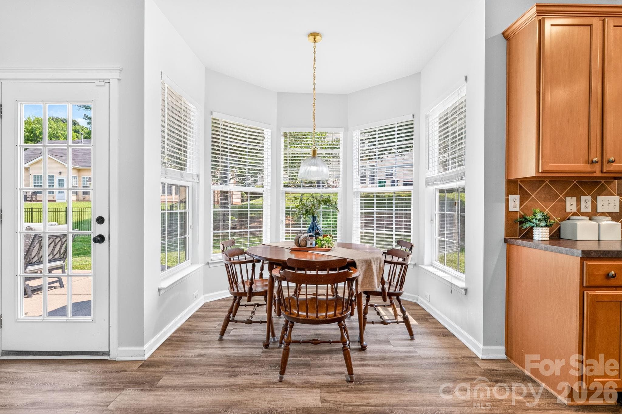 Breakfast Nook. Sunny breakfast nook overlooking the backyard. - Charlotte