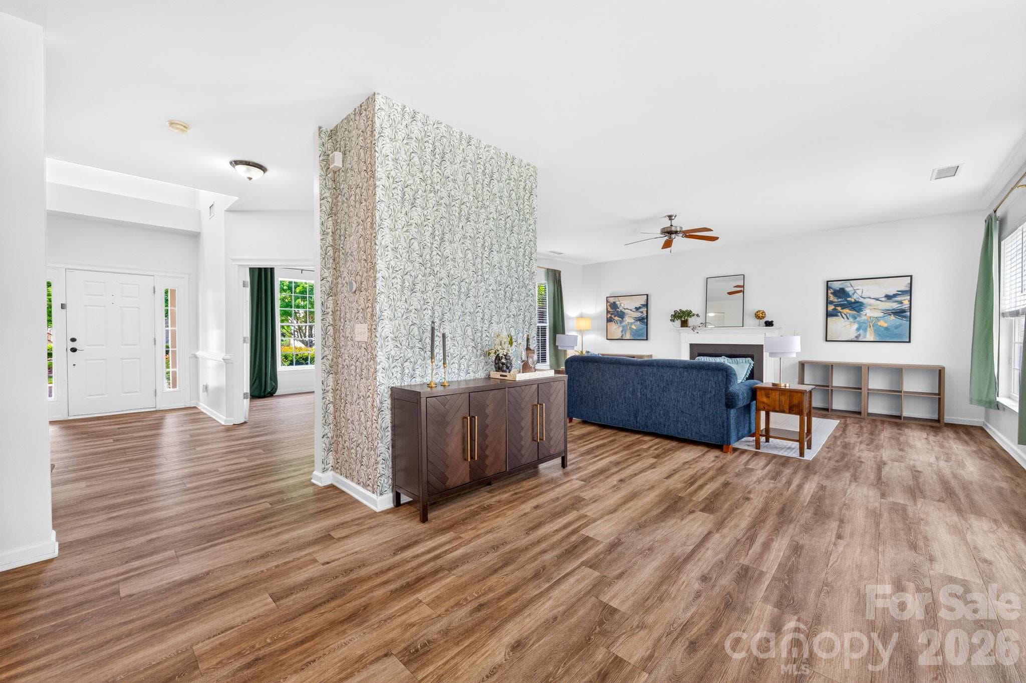 Main Living Area. Open-concept layout seamlessly connecting the living and dining spaces. - Charlotte