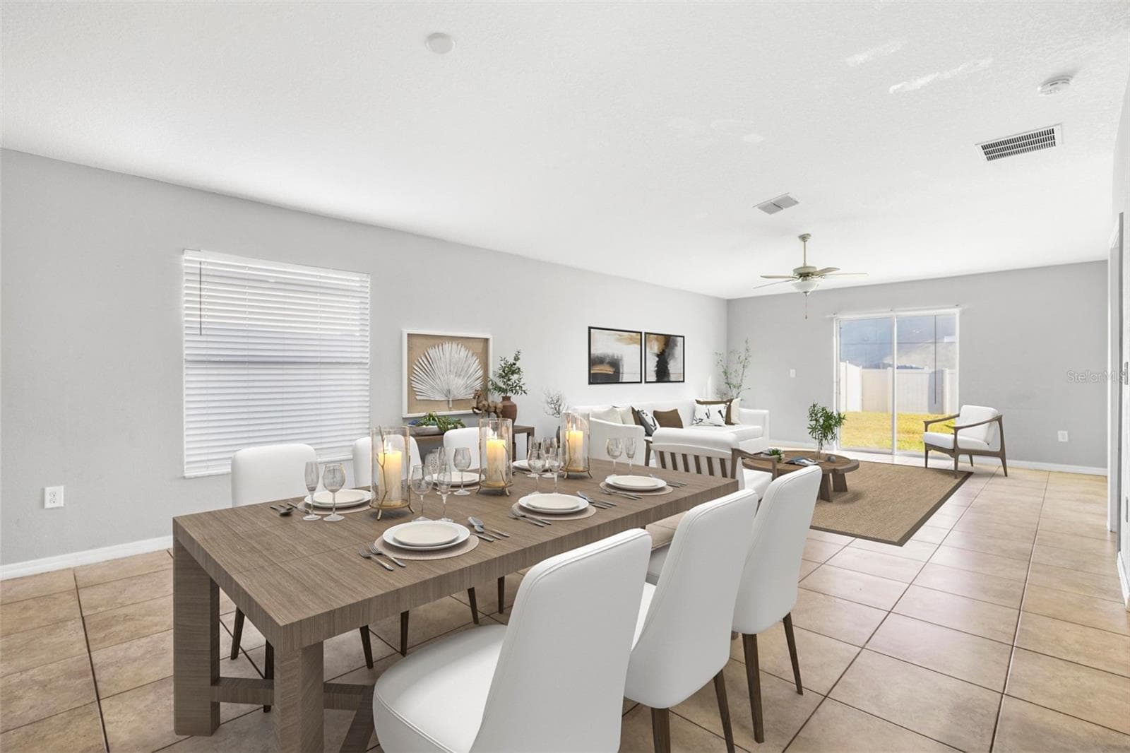 From the great room, the centrally located kitchen creates a natural hub with a spacious peninsula, recessed lighting, and easy access to the pantry, laundry room and garage. - 6810 TRENT CREEK DR, SUN CITY CENTER