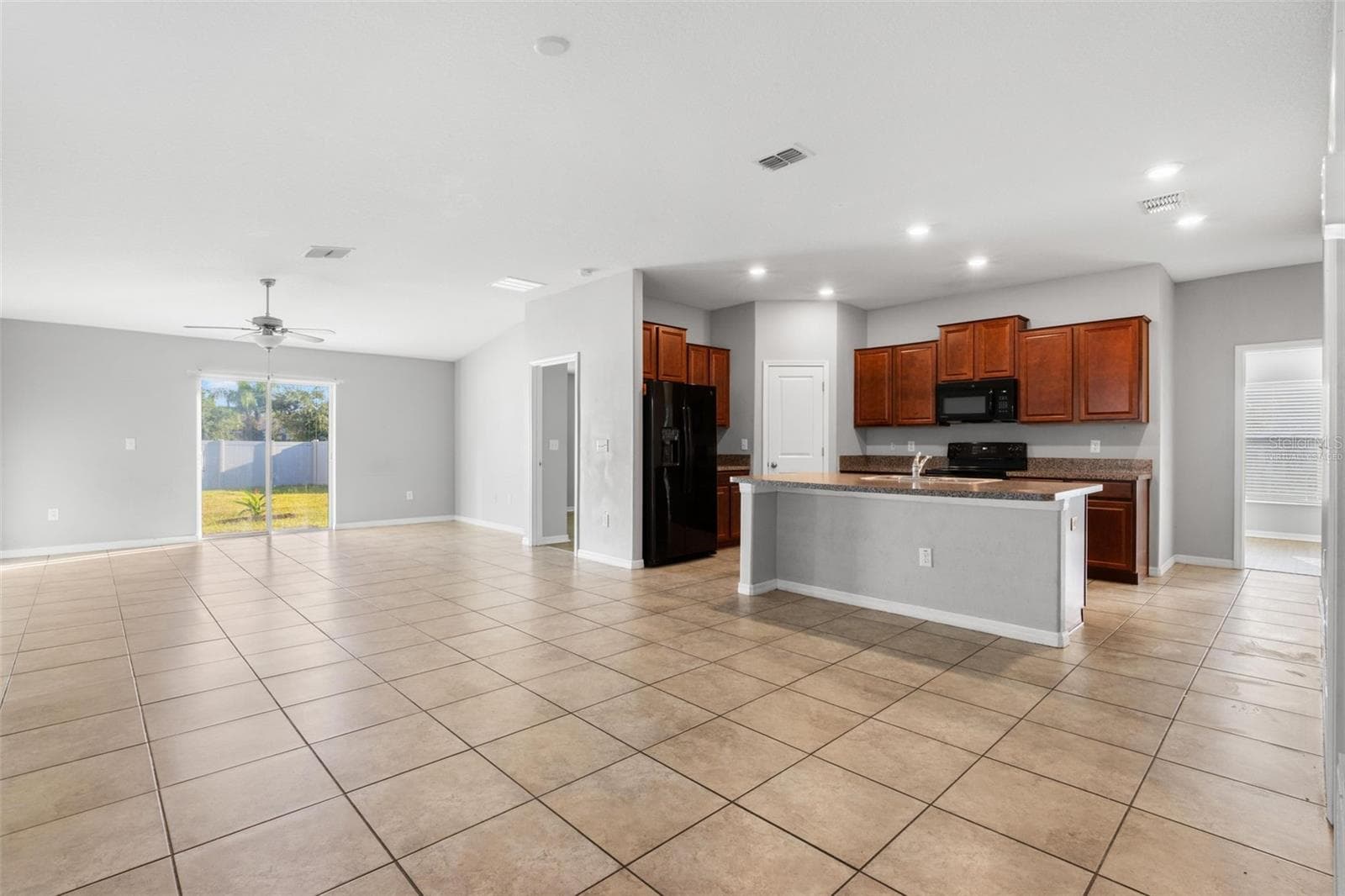 Virtually staged to illustrate the room’s generous proportions and potential furniture placement. - 6810 TRENT CREEK DR, SUN CITY CENTER