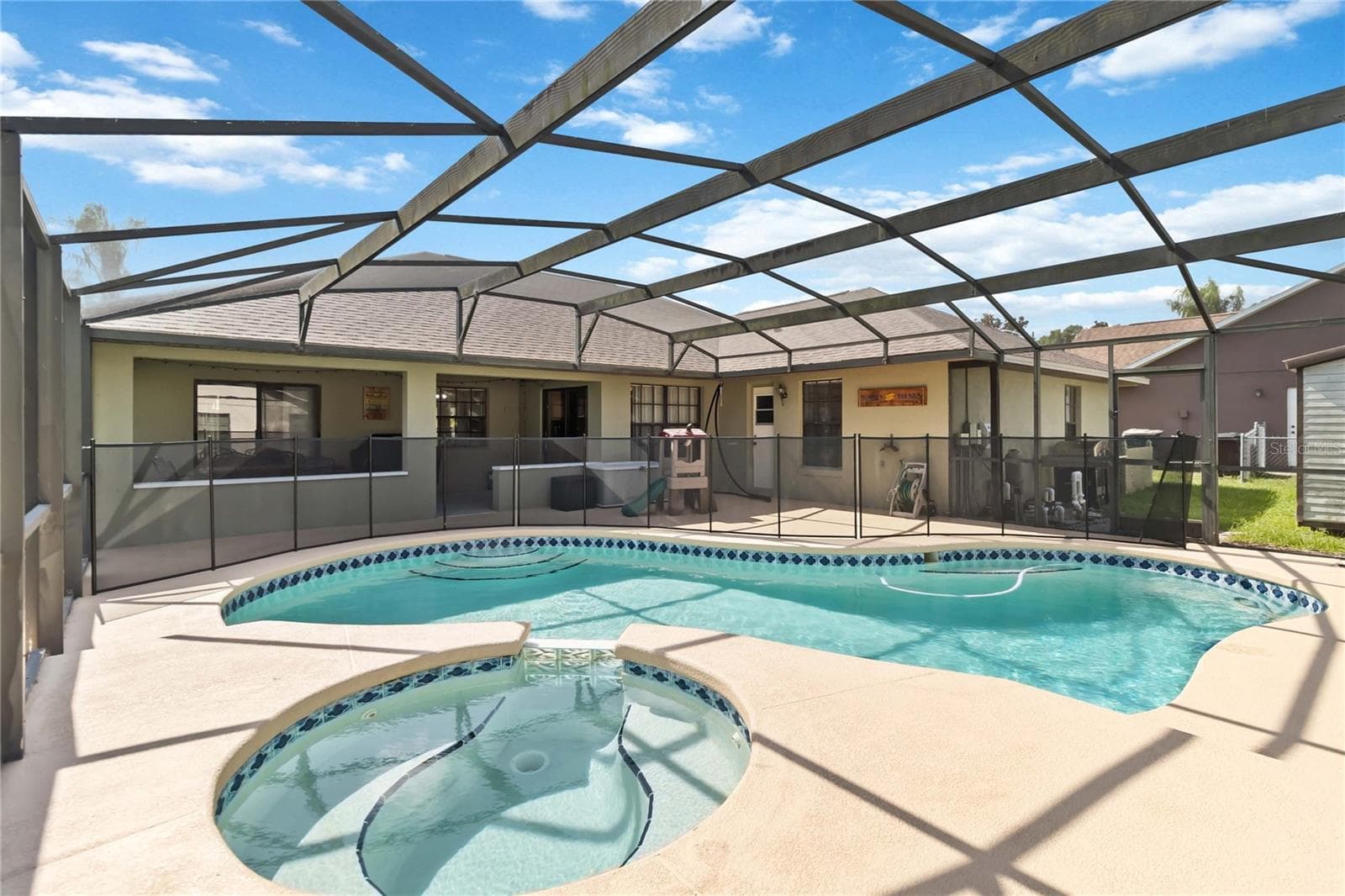 Spa overlooking Inground Pool - 2207 DEATA CT, ST CLOUD