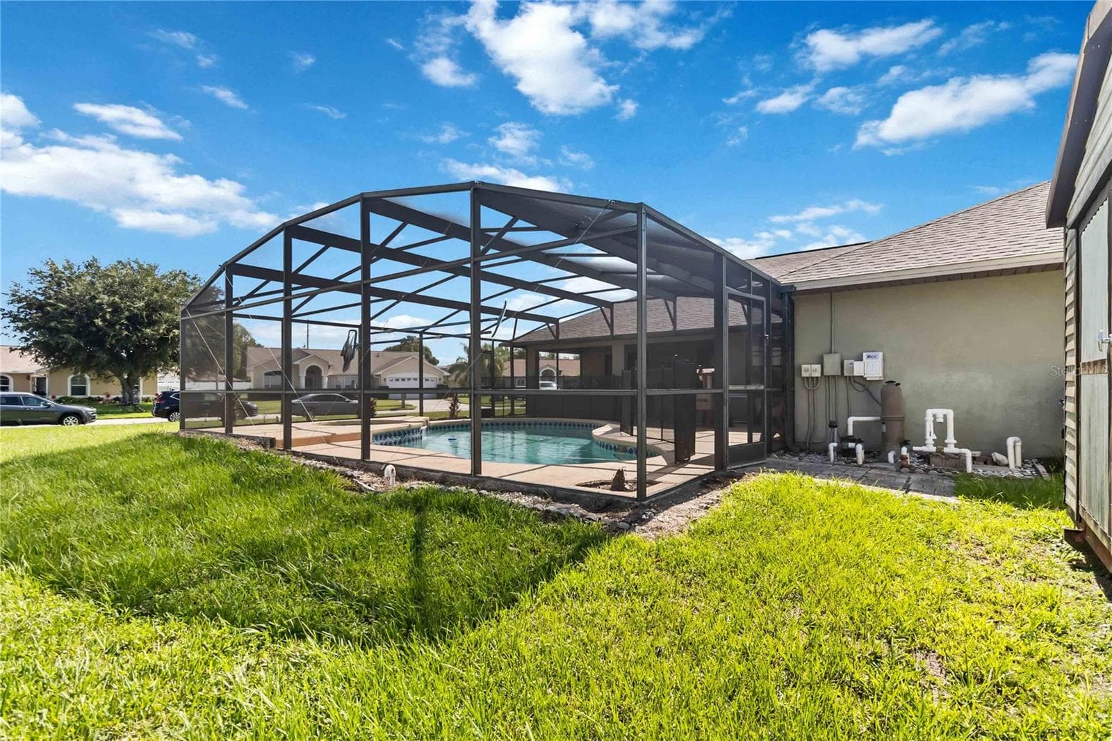 Rear of Home with Screen Enclosed, Inground Pool - 2207 DEATA CT, ST CLOUD