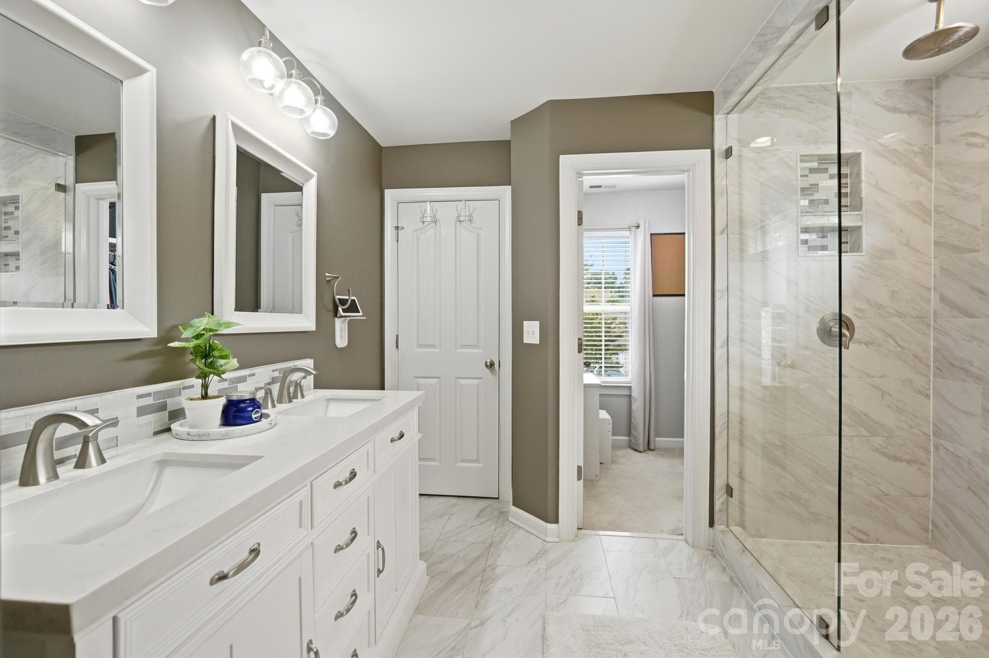 heated floors, large double-head shower, double vaniety - Monroe