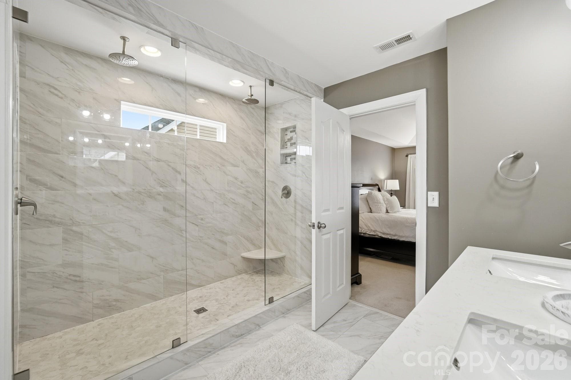 heated floors, large double-head shower, double vaniety - Monroe
