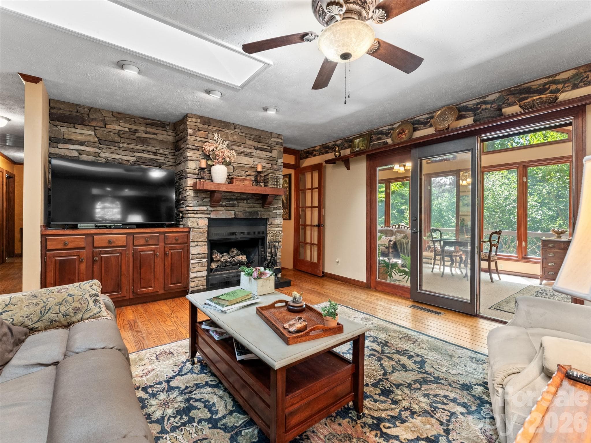 Family Room with Access to Sunroom - 3 Westbridge Drive, Hendersonville